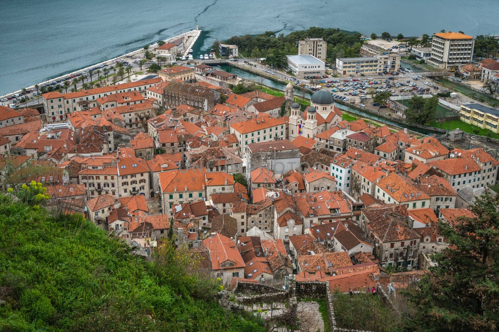 Aerial view of the red tiled houses roofs of Kotor Old town, Montenegro