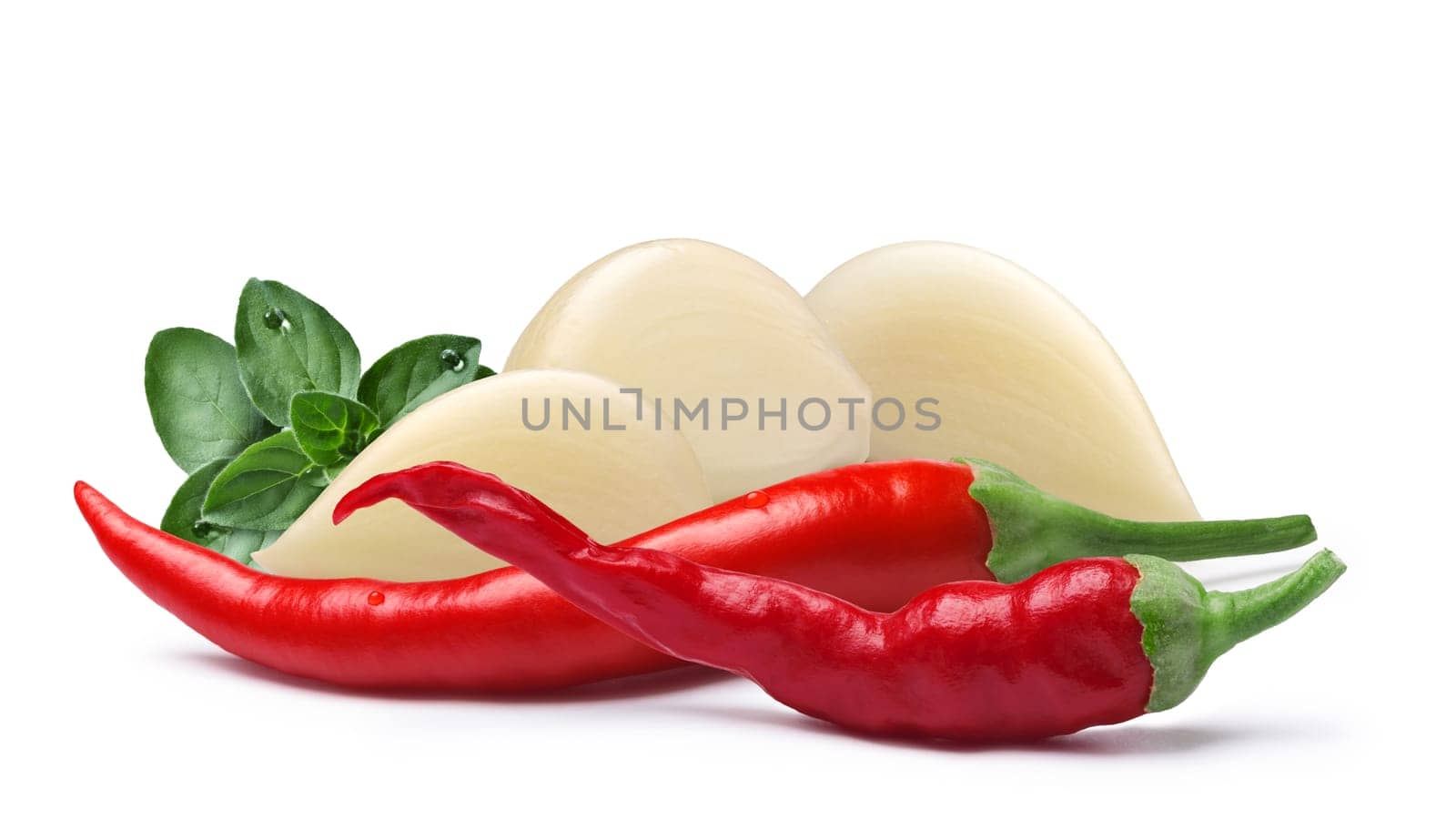 Garlic cloves with oregano and cayenne pepper. Clipping paths, shadow separated. Design elements