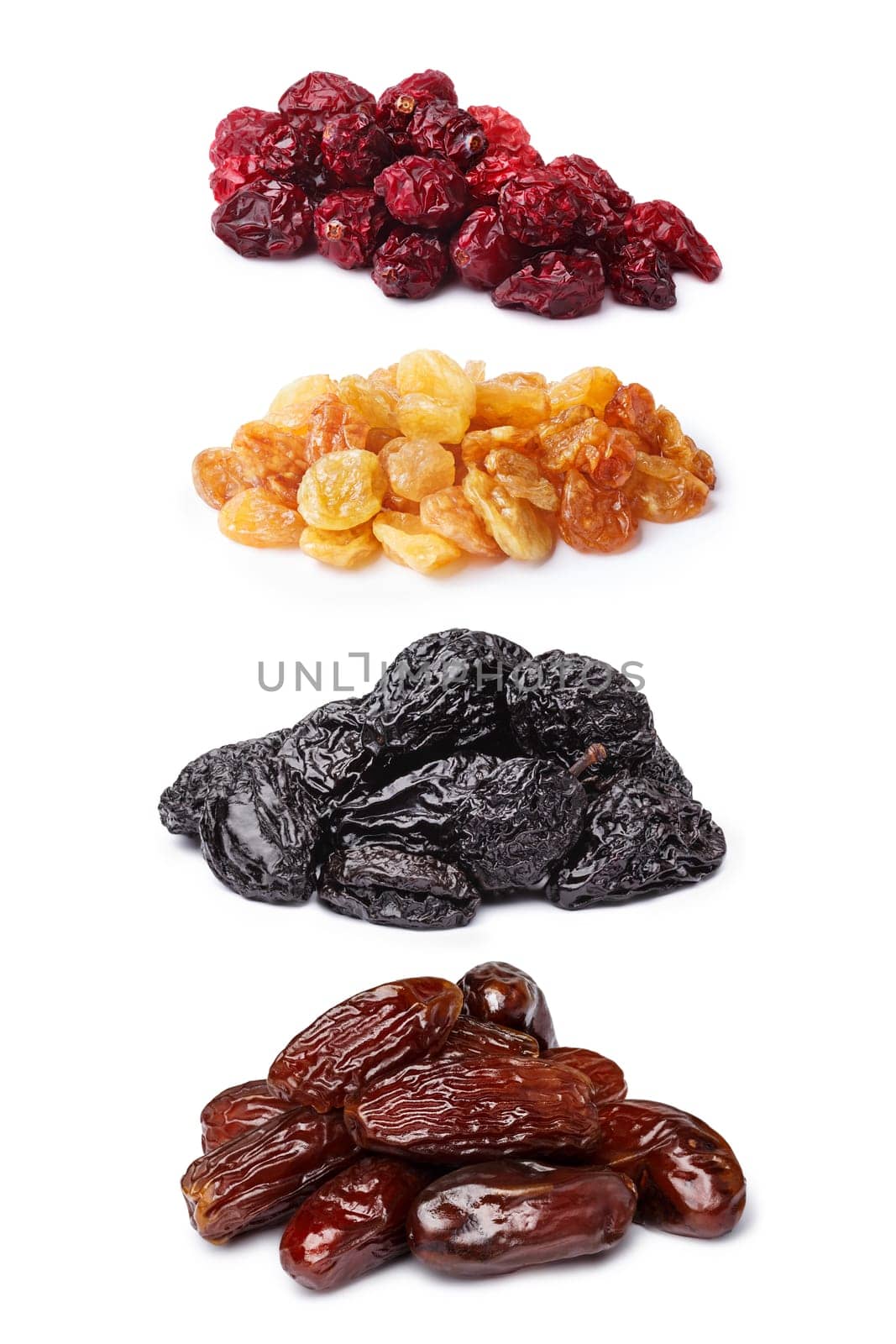 Set of dried berries and fruits: raisins,prunes,cranberry,dates. Clipping paths,infinite depth of field