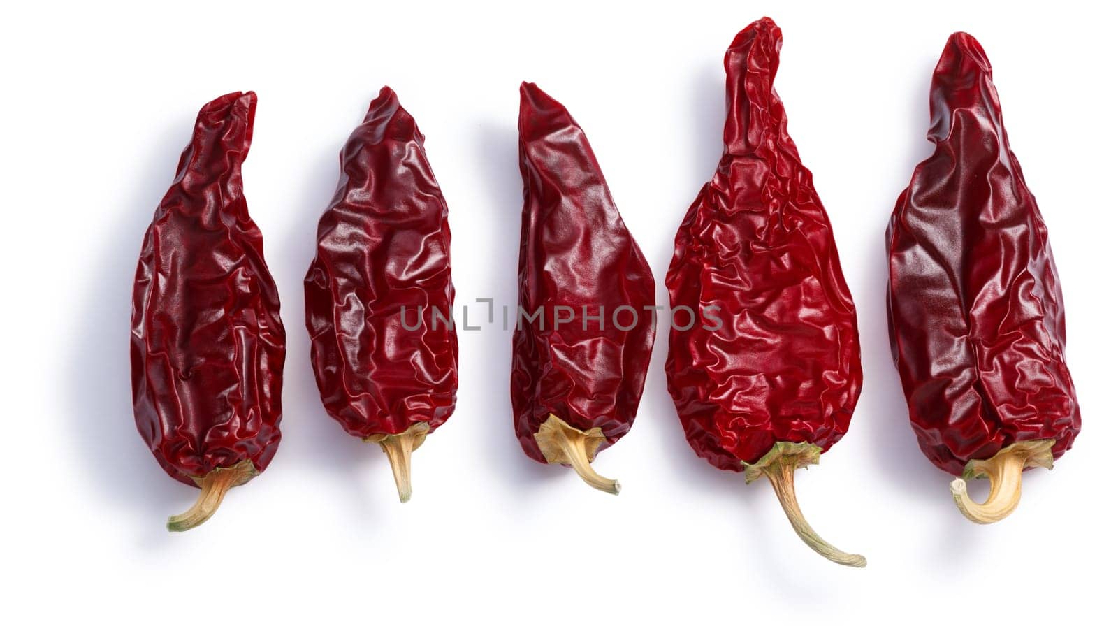 Chiles seco del norte, a ripe dried Anaheim peppers. Clipping paths, shadows separated, top view