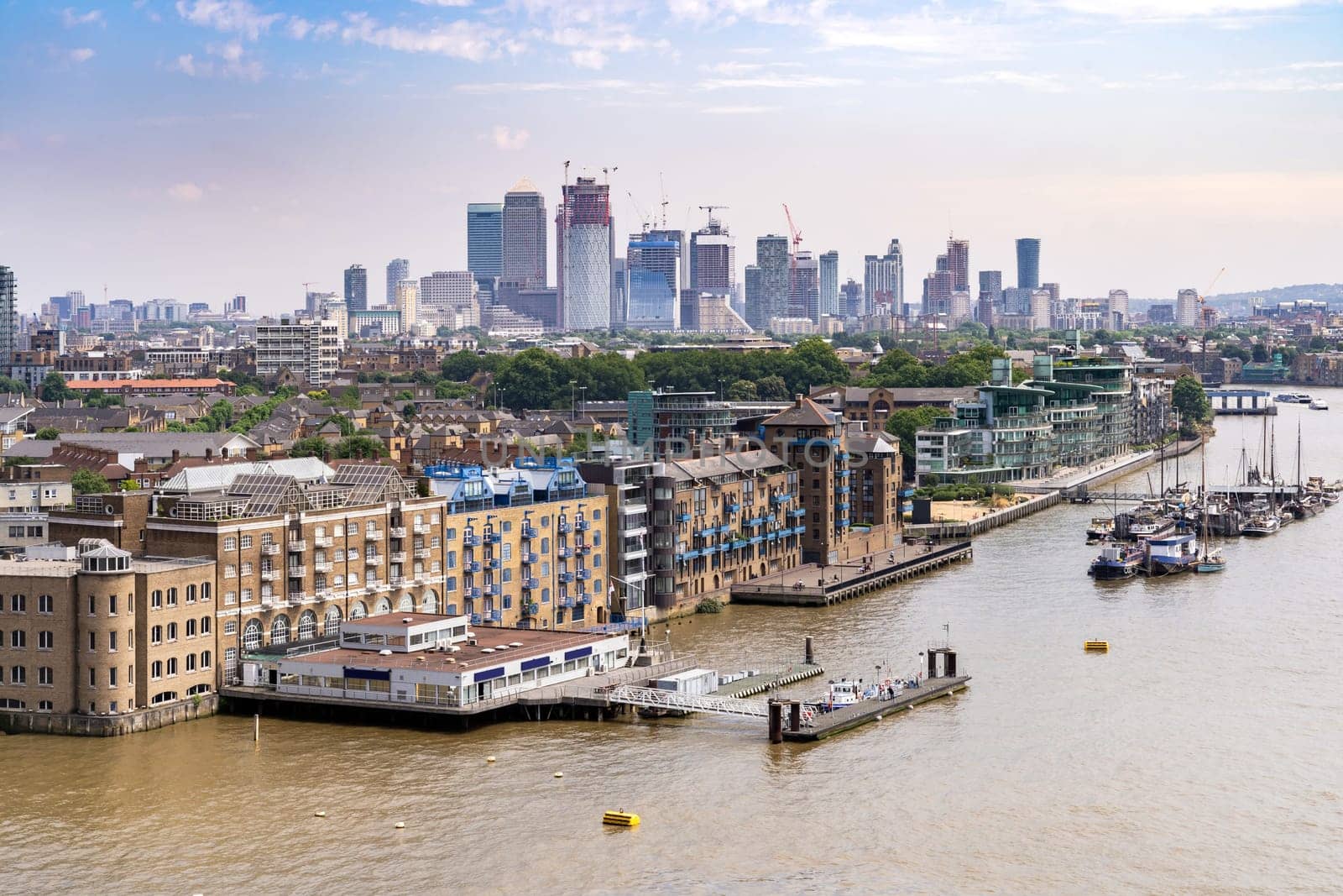 London cityscape with River Thames to Canary Wharf skylines building in London UK