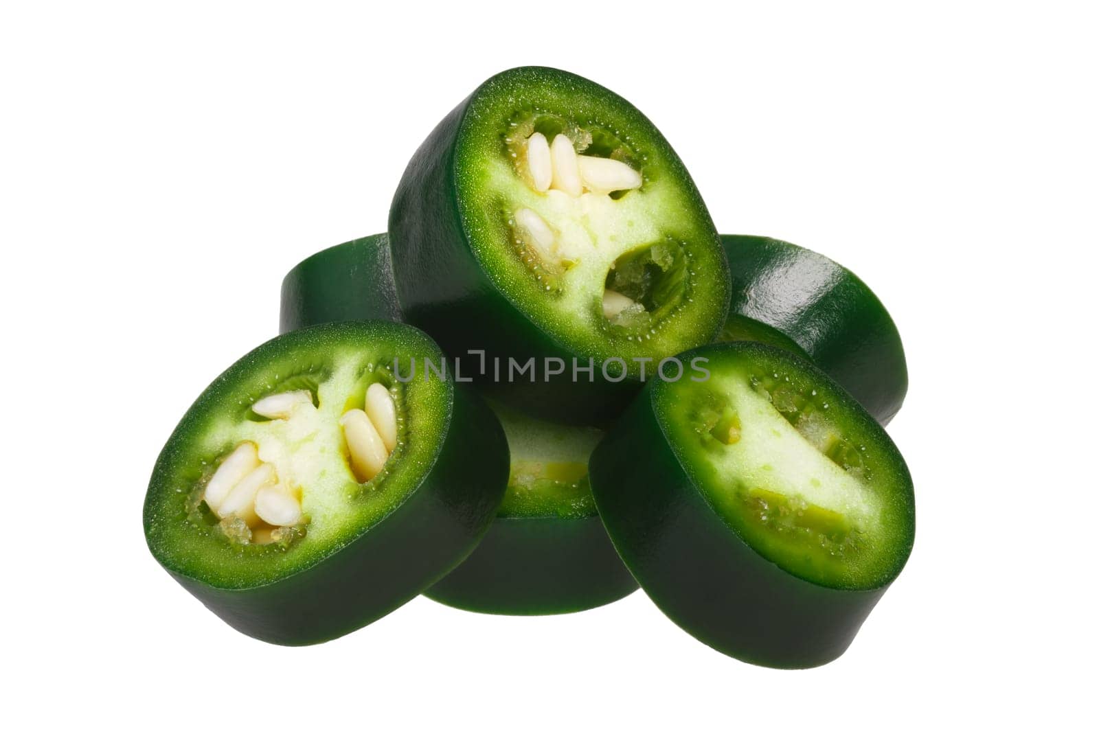 Sliced green Serrano pepper (Capsicum annuum). Clipping path, shadowless