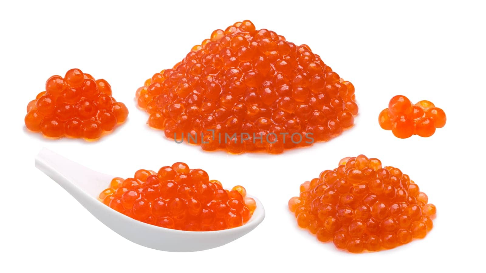 Red caviar or salmon roe in piles, spoonful
