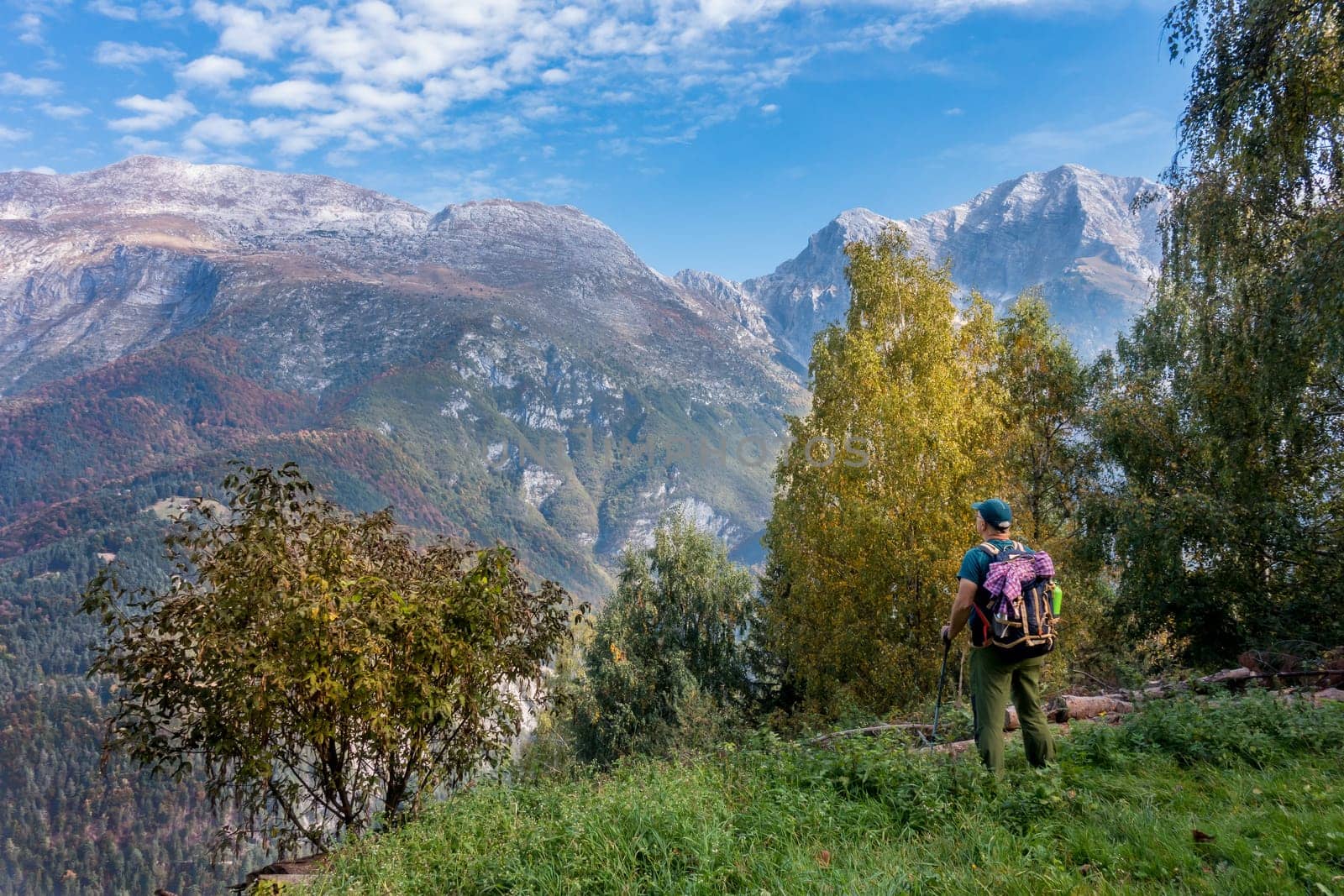 Man hiker watch the landscape of  mountain in autumn