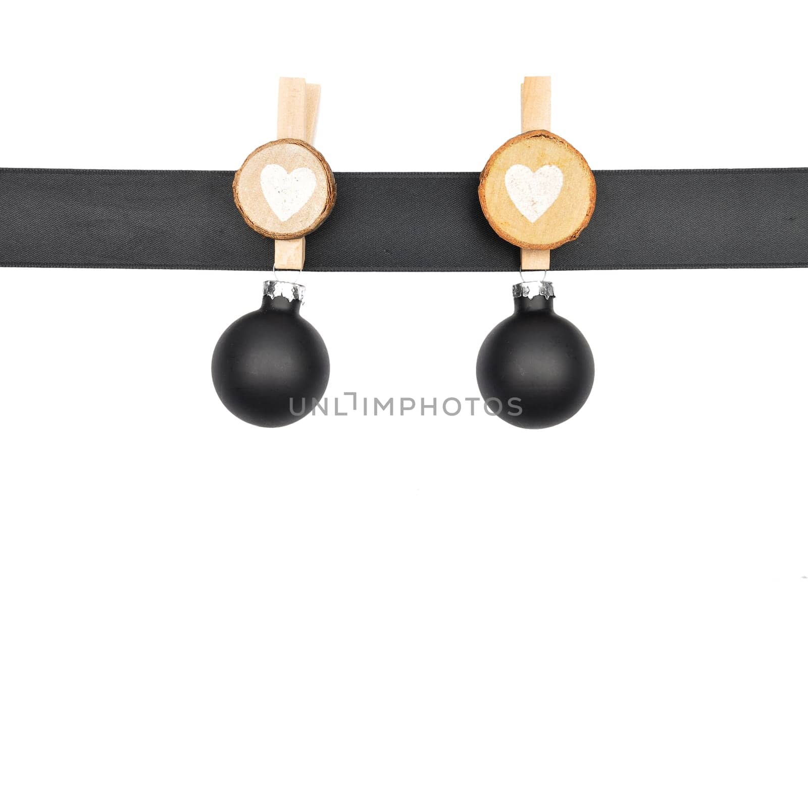 Background with black ribbon and christmas baubles