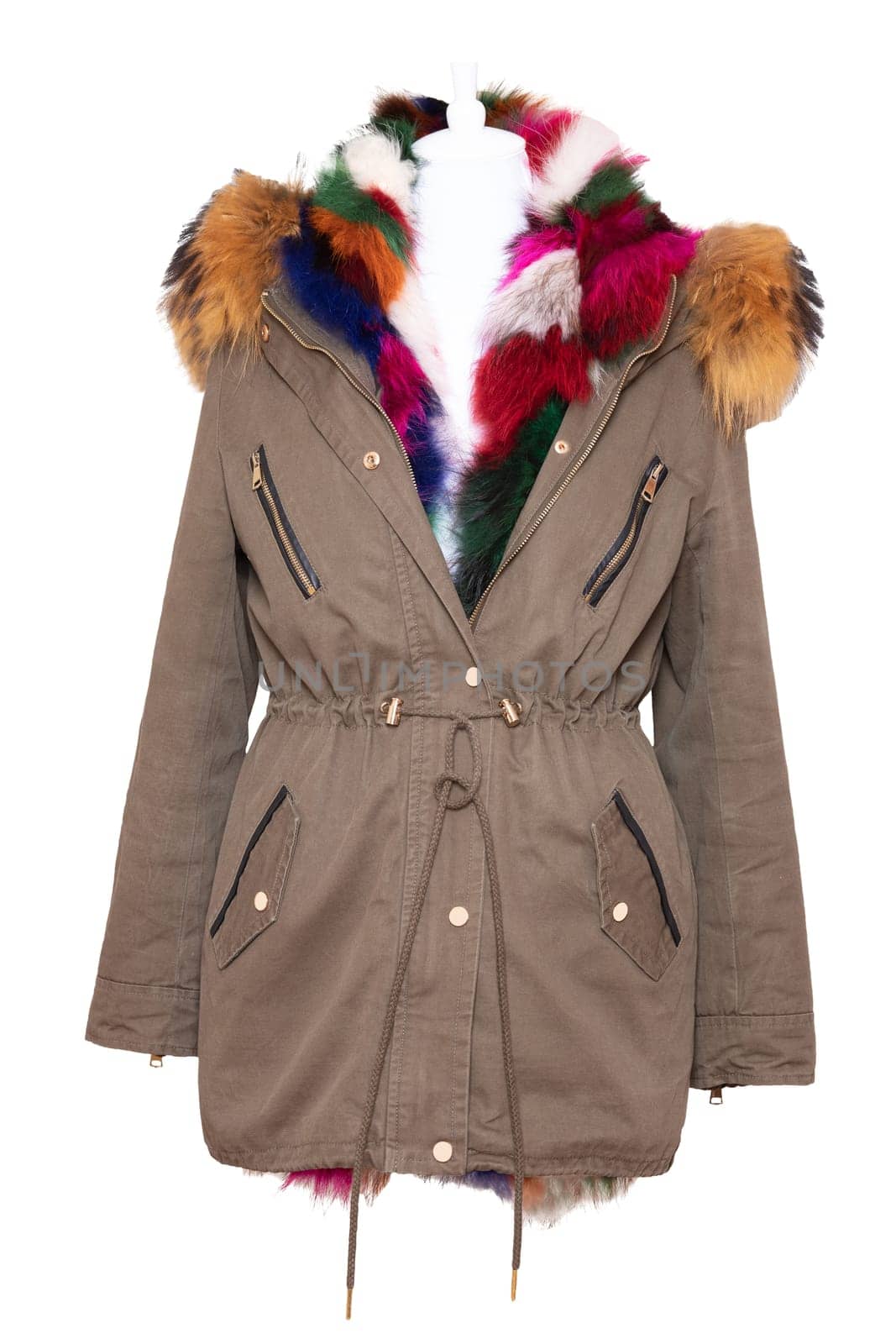 Woman coat isolated. A luxurious and stylish elegant parka with colorful fur on mannequin isolated on a white background. Winter fashion.