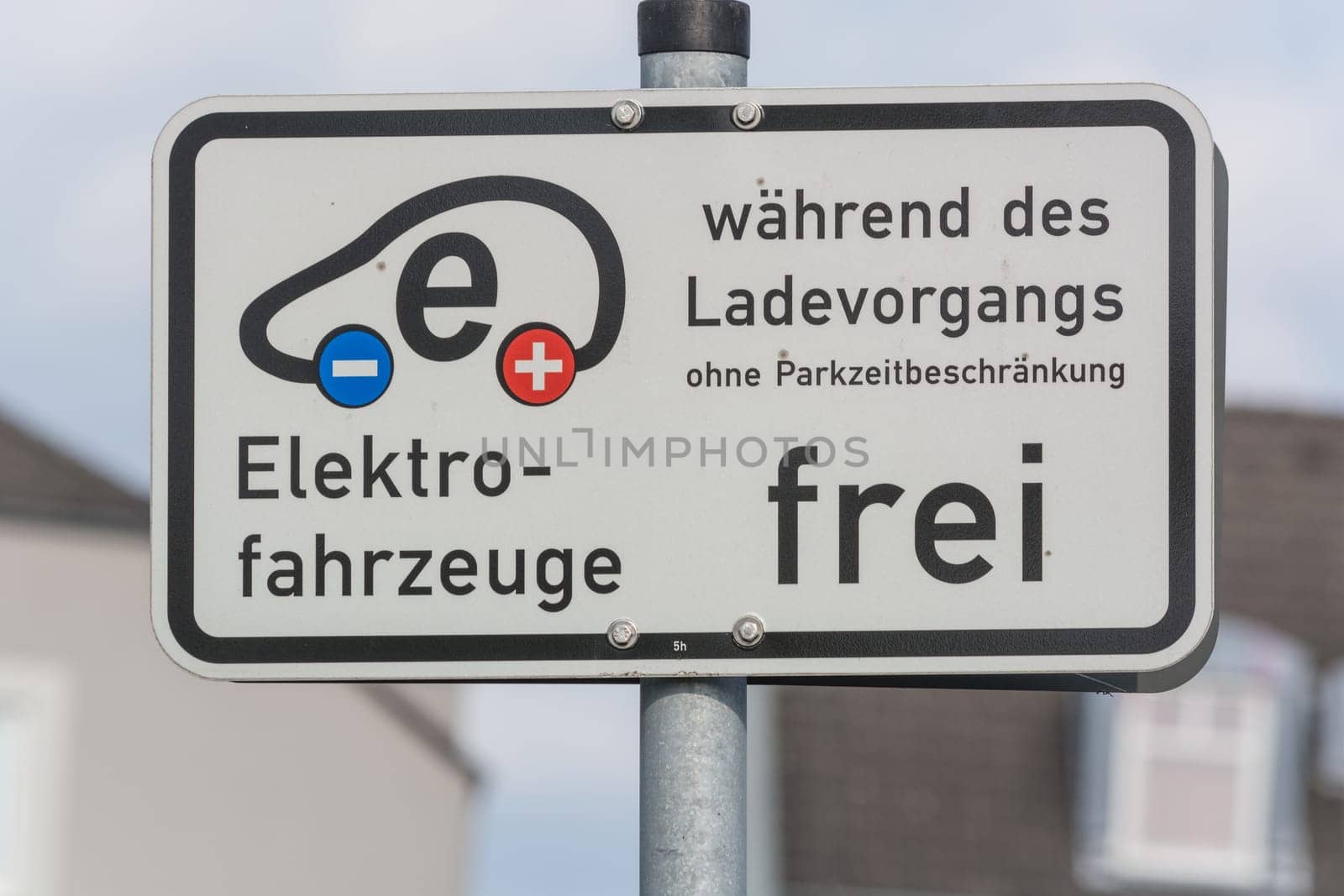 HEILIGENHAUS, NRW, GERMANY - AUGUST 24, 2017: Parking in Heiligenhaus charging of modern electric car on the road is the future of the automobile