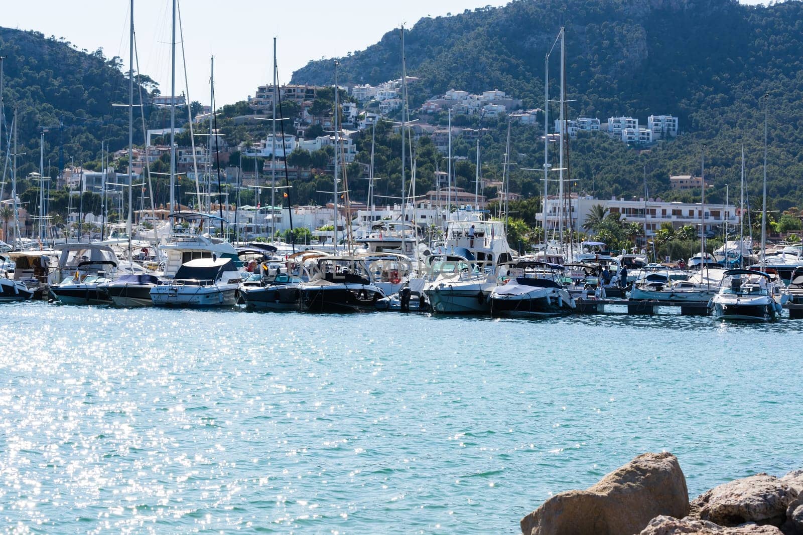 PORT ANDRATX, SPAIN - JUNE 01, 2016:.View of the Bay of Port Andratx Mallorca Baleares Spain. In the background motor boats and sailboats.
