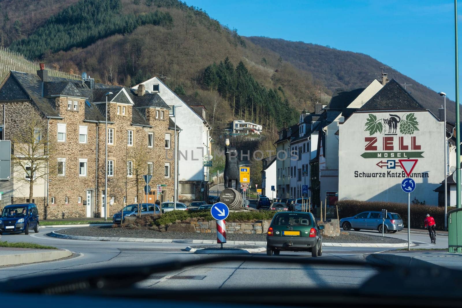 ZELL, GERMANY - MARCH 26, 2016: Entrance to Zell am Mosel with roundabout and view of the symbol and logo for the famous wine of Zell, Moselle, Rhineland-Palatinate, Germany, Europe.