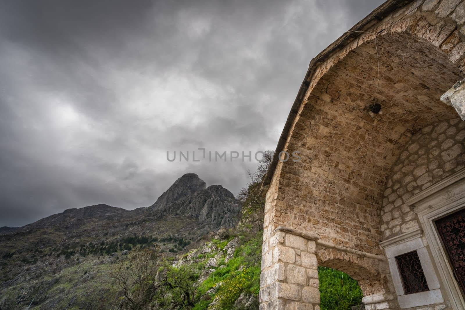 Arched entrance to The Chapel of Our Lady of Salvation on the hillside above Kotor, Montenegro