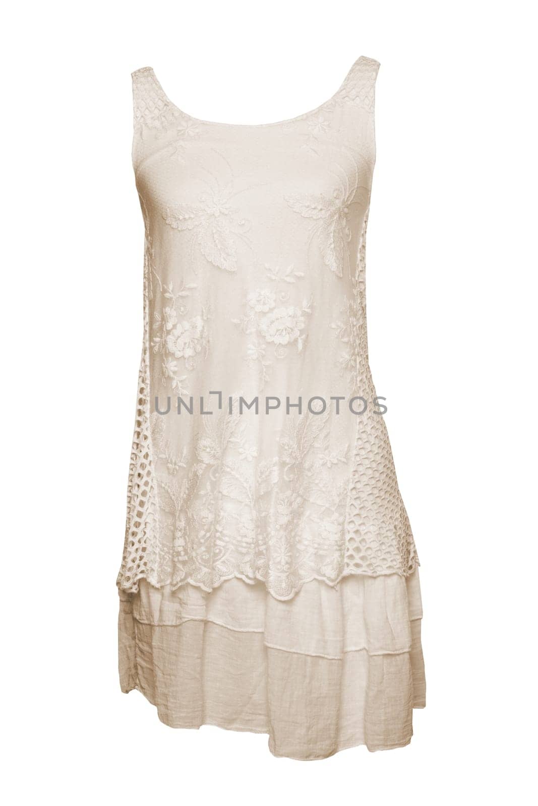 Fashionable summer clothes isolated on a white background. Beige summer dress. Colorful lacy and elegant sleeveless  summer dress isolated on white background. Nobody.