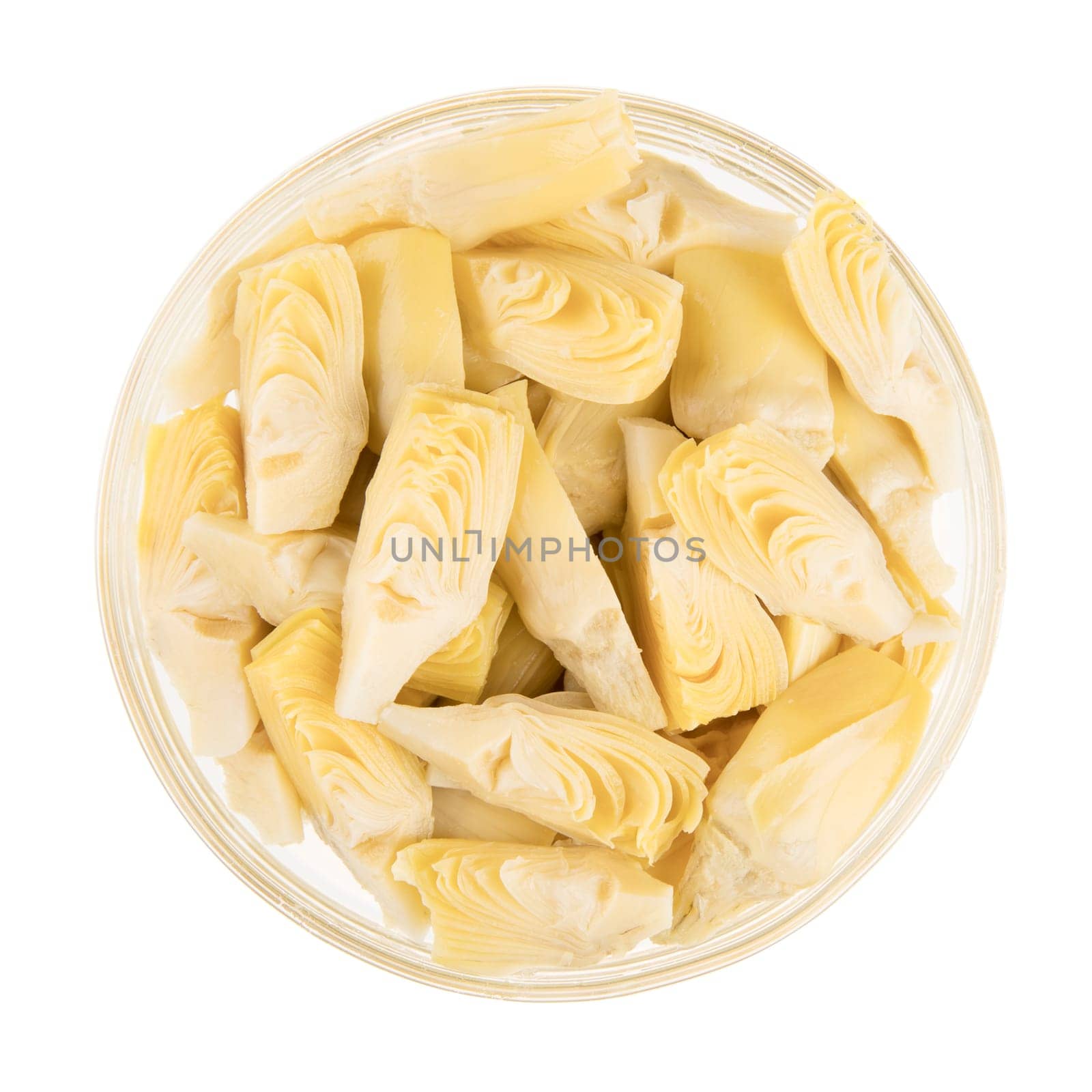 Quartered artichoke hearts isolated on white background and viewed from above.