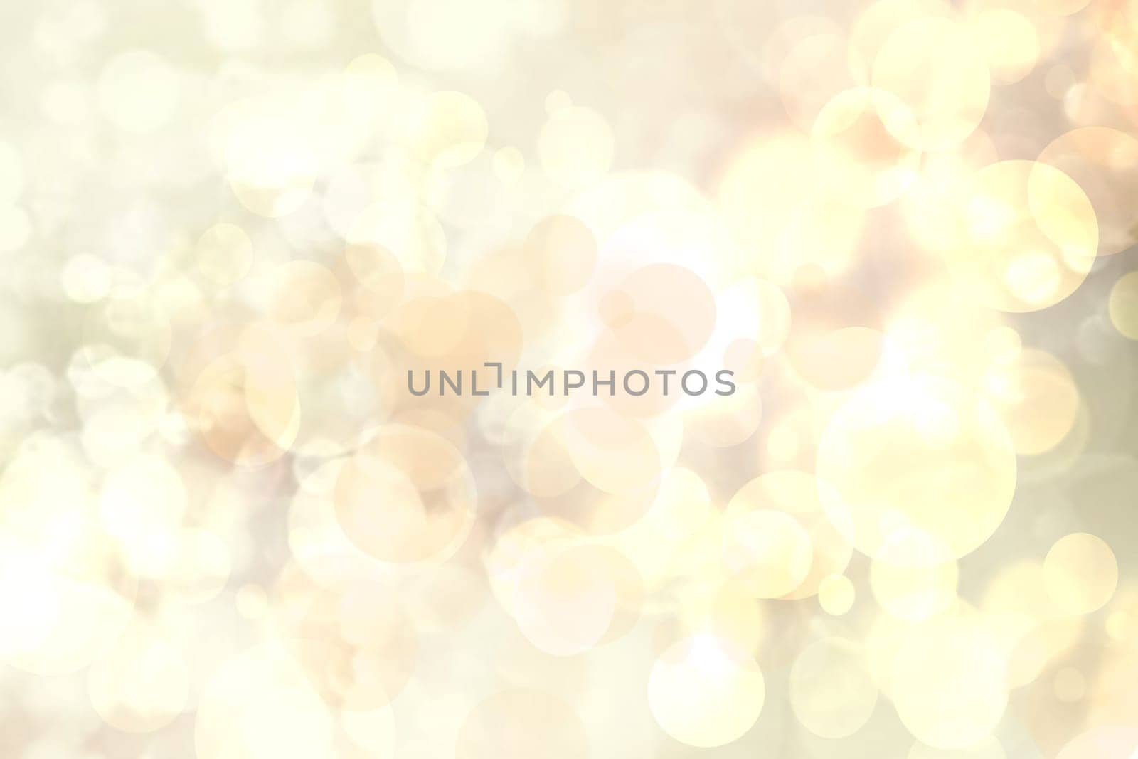 Abstract pink light golden festive background texture with sparkle bokeh lights. Beautiful texture for Christmas or other holidays.