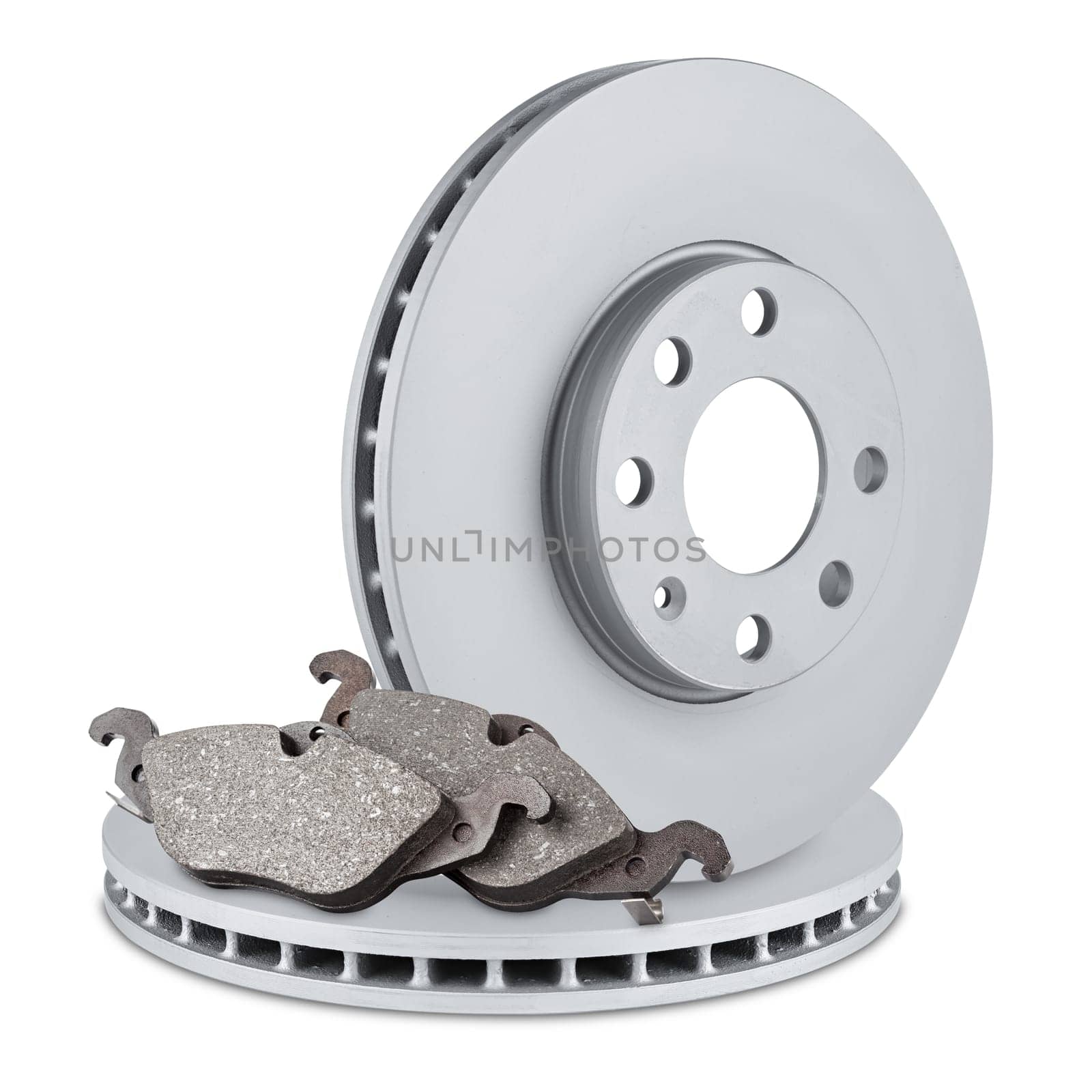 pair of car brake discs and pads on white background