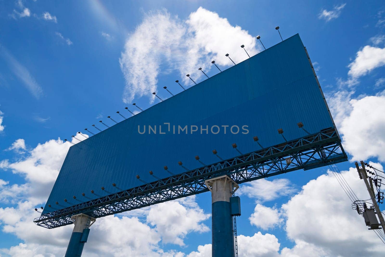 Advertisement with copy space at landscape with sky and clouds