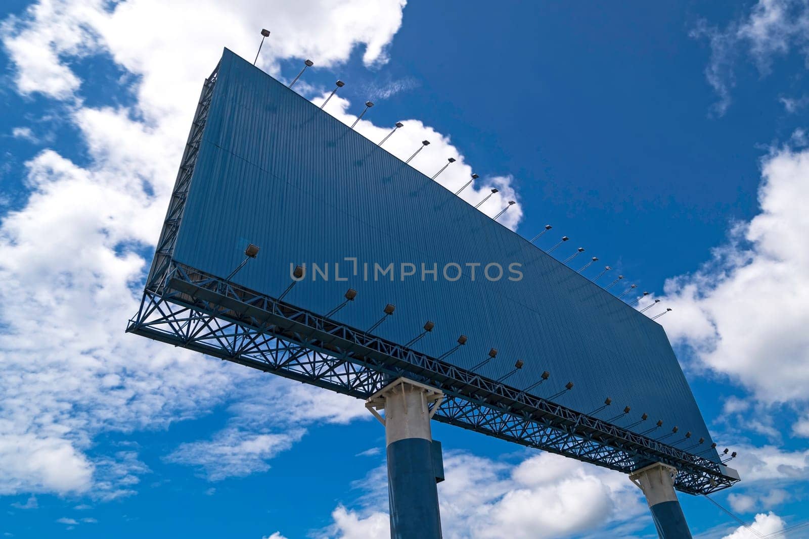 Advertisement with copy space at landscape with sky and clouds