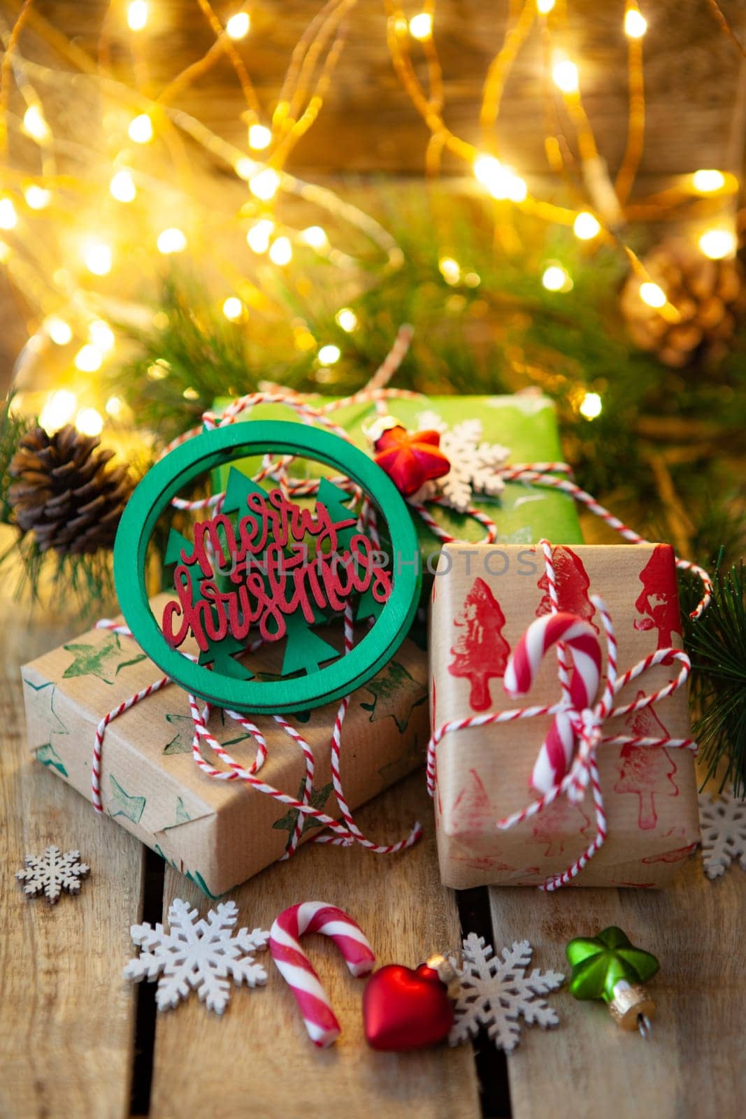 Little wrapped presents and festive lights for a Merry Christmas / Happy Holidays