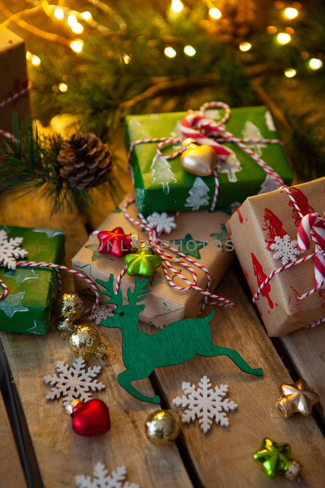 Little wrapped presents and festive lights for a Merry Christmas / Happy Holidays