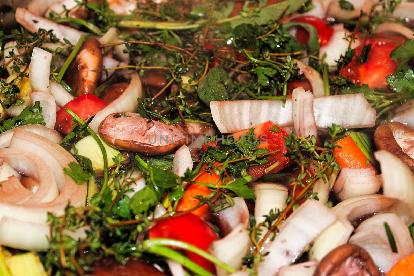 A background of various vegetables herbs and mushrooms.