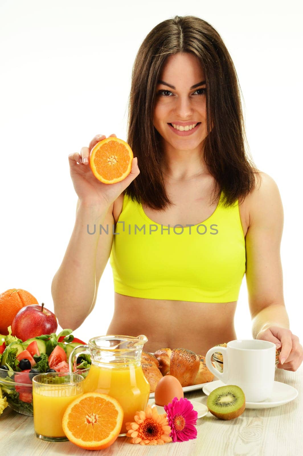 Young woman having breakfast. Balanced diet.