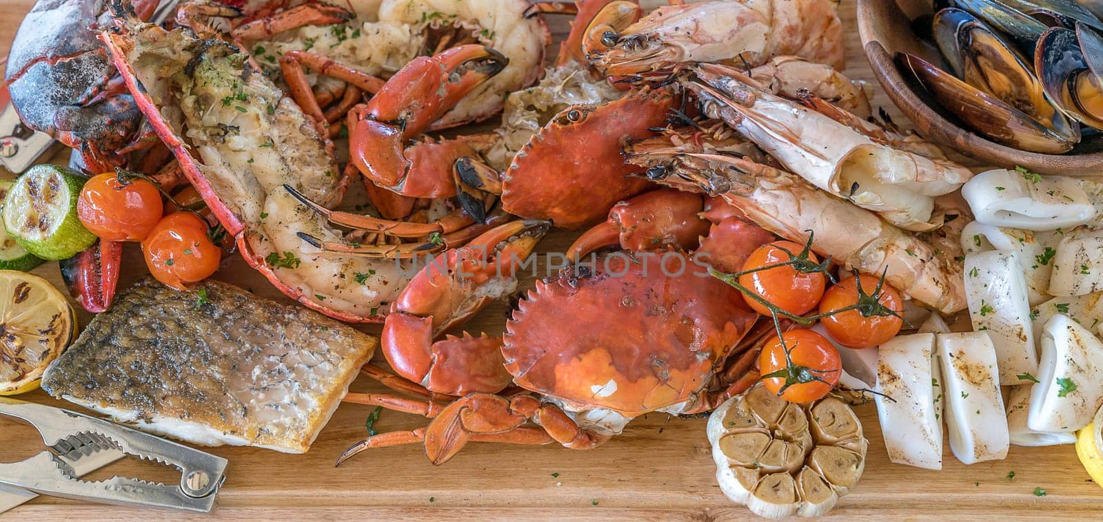 groumet seafood platter on wooden plate
