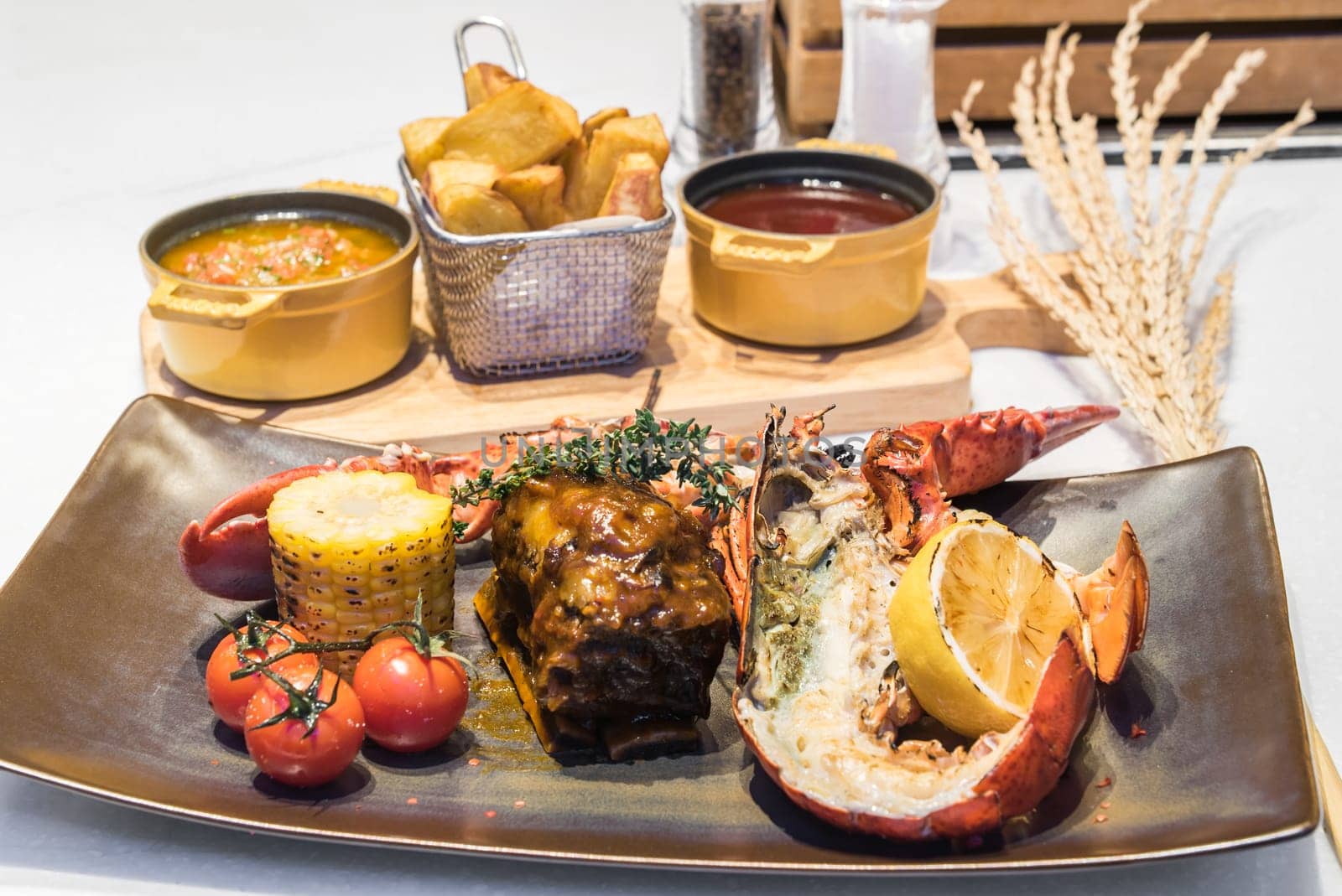 Surf and Turf, grilled canadian lobster and grilled beef ribs