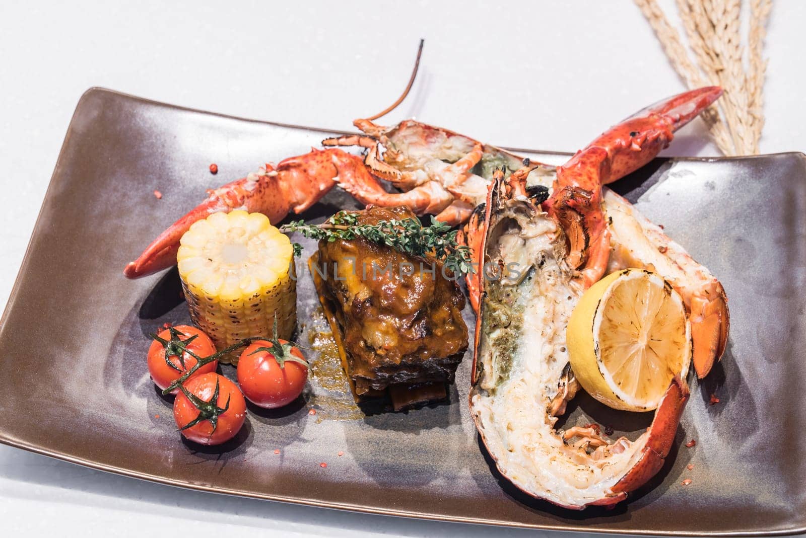 Surf and Turf, grilled canadian lobster and grilled beef ribs