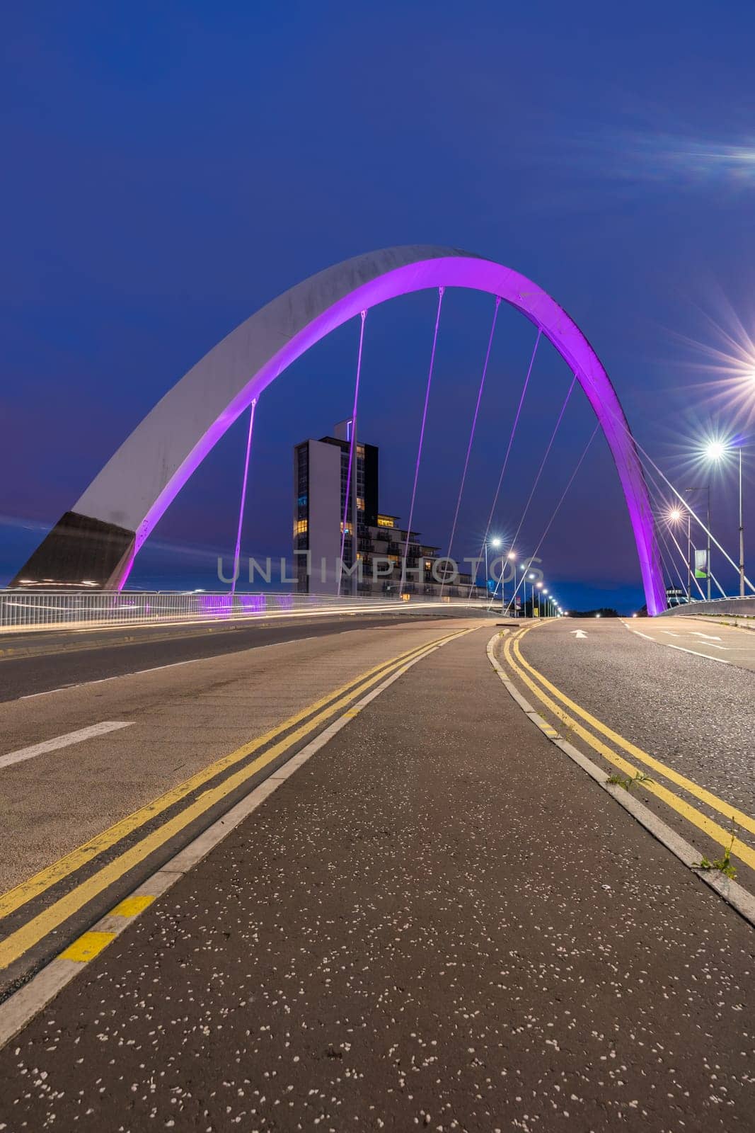 Clyde Arc Bridge along River Clyde Sunset twilight at Glasgow city Scotland UK.
