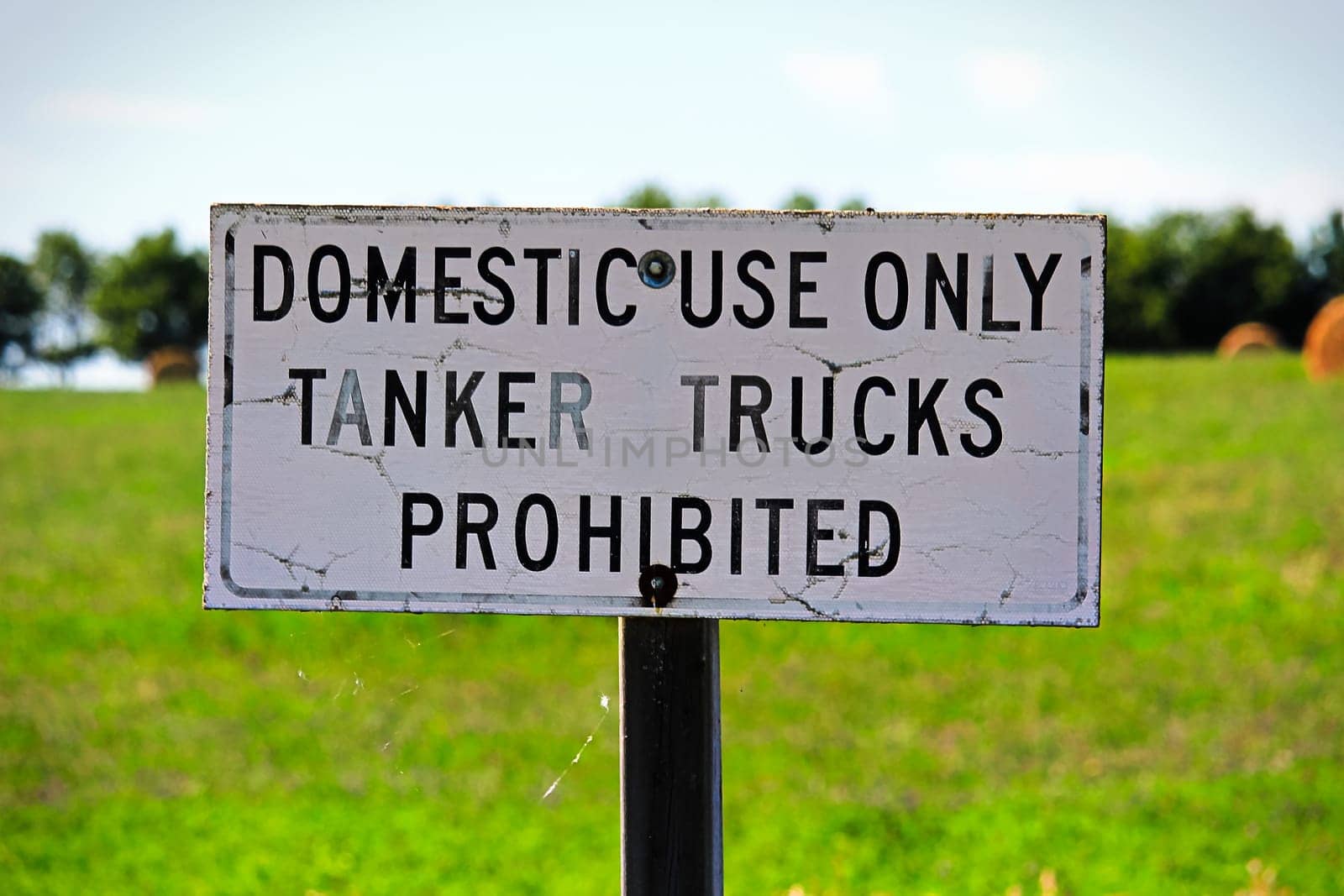 Domestic Use Only Tanker Trucks Prohibited sign.