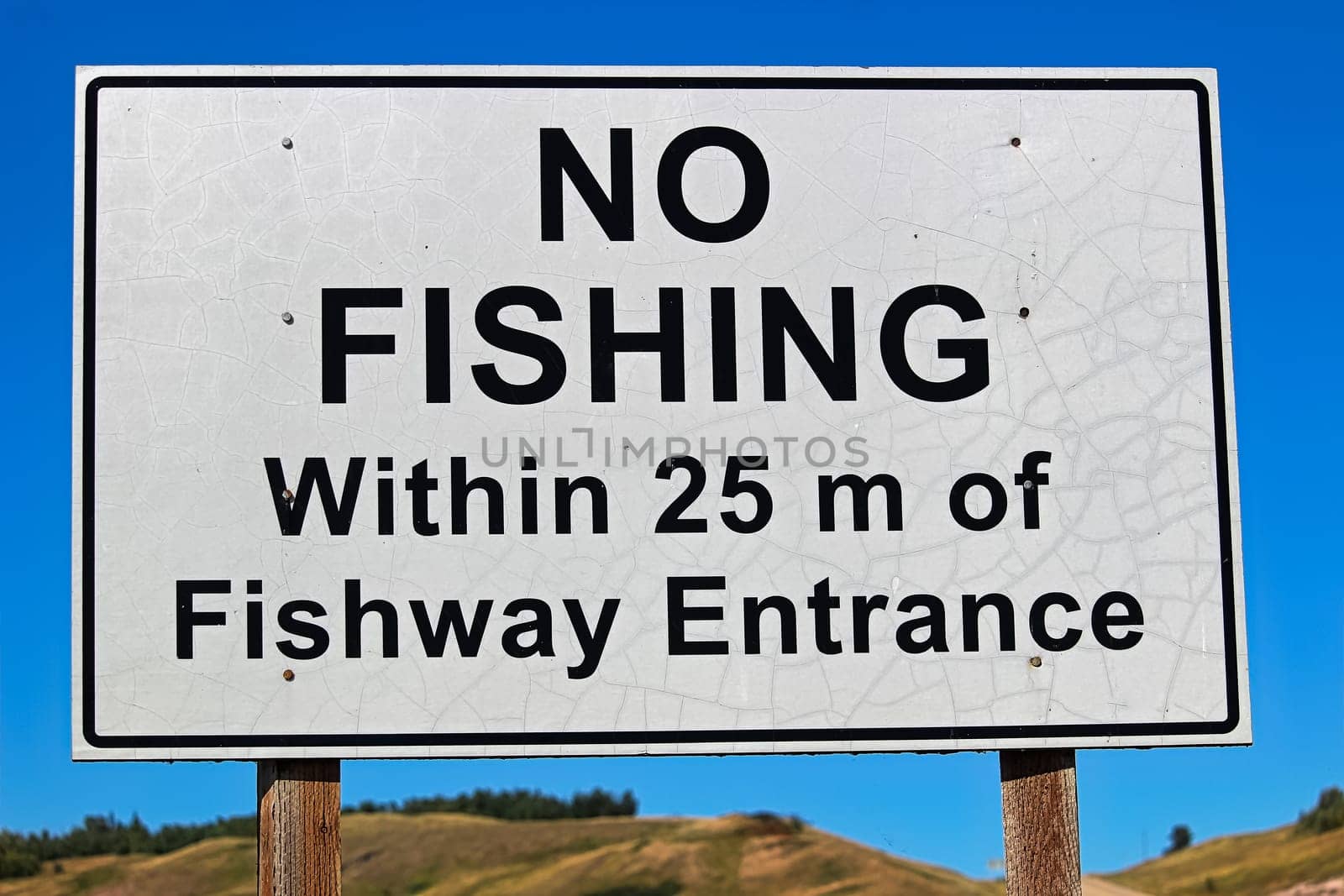 A No Fishing Within 25m of Fishway Entrance sign.