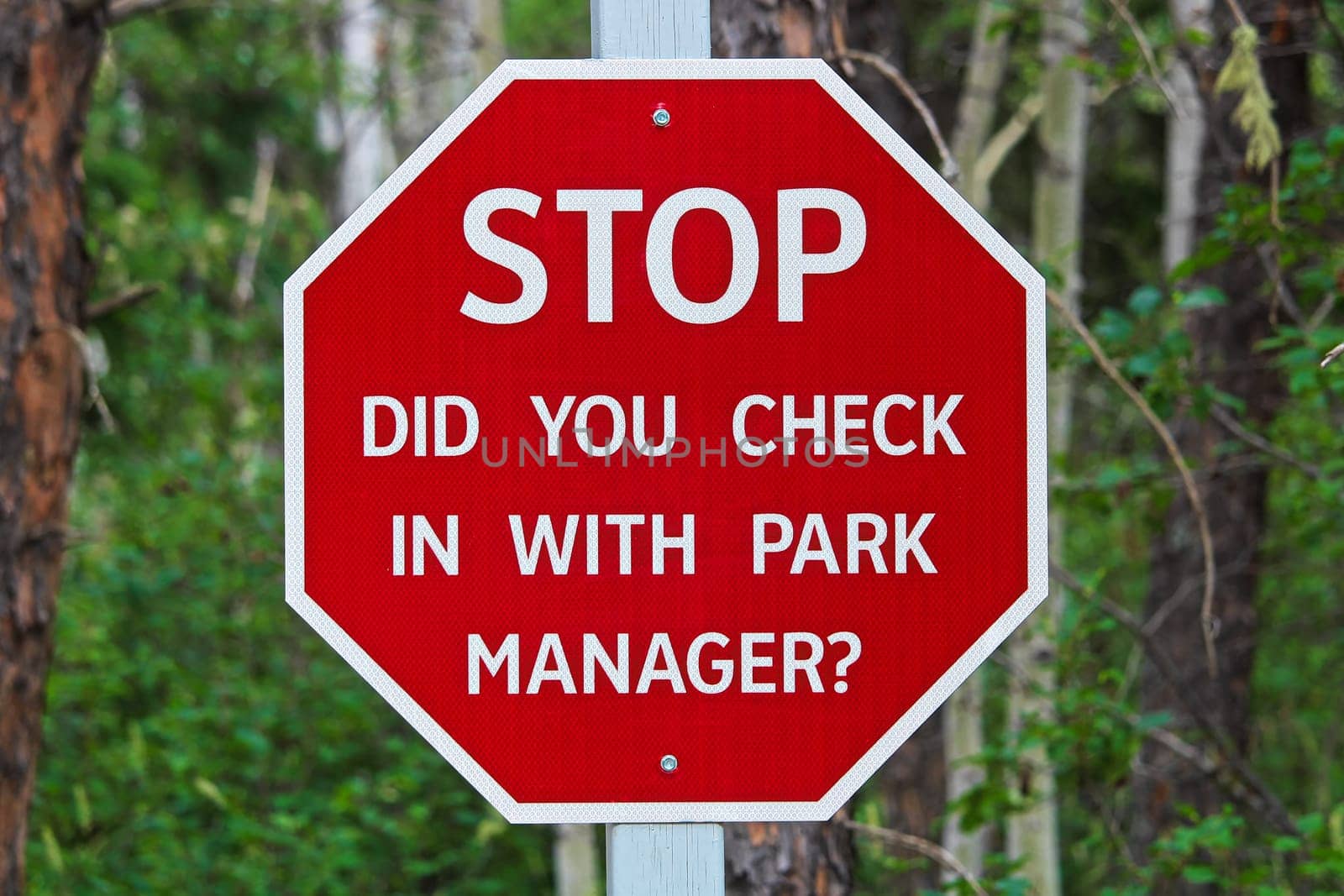 A stop, did you check with the park manager sign.