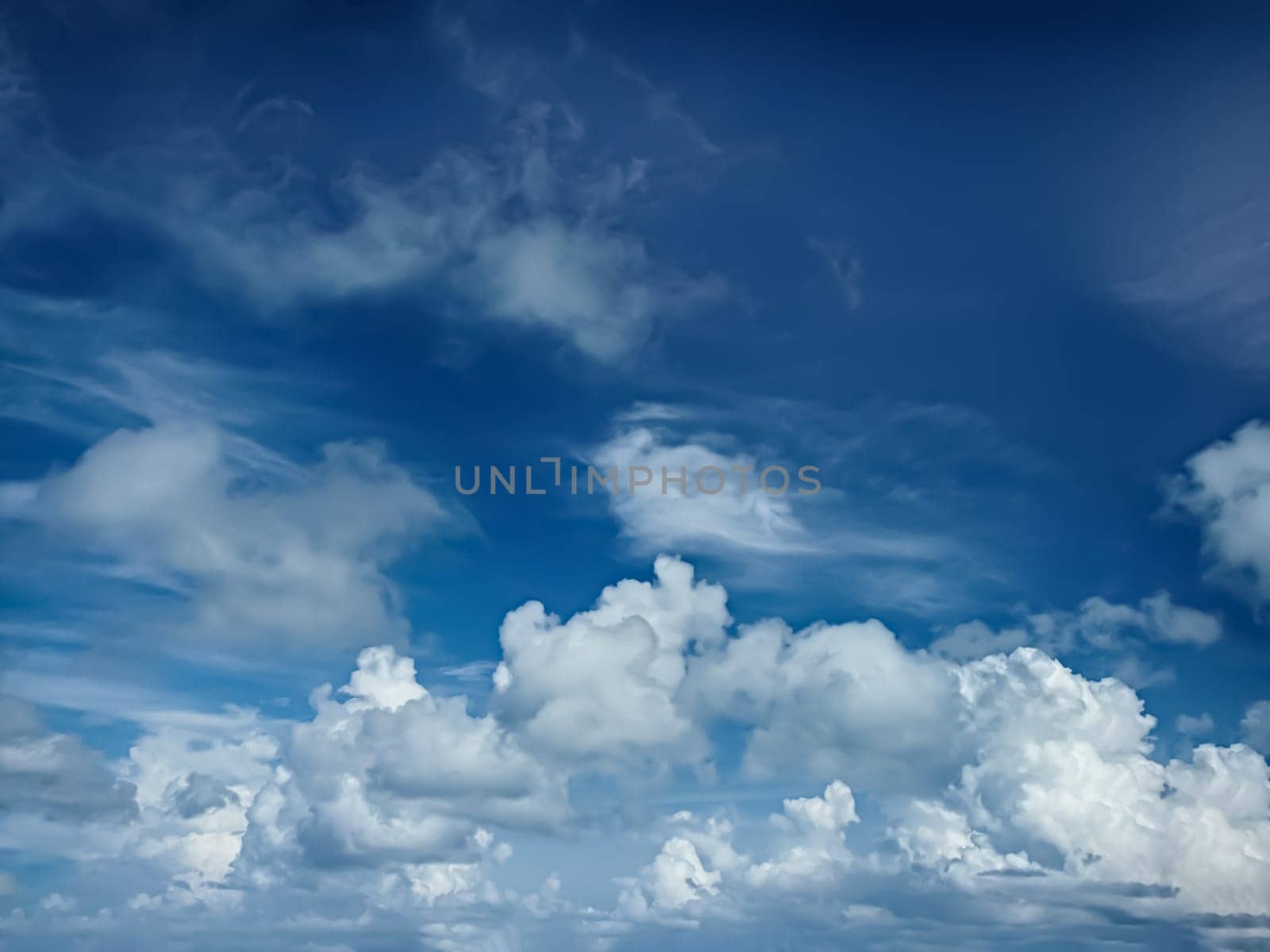Beautiful cumulus clouds in the blue sky