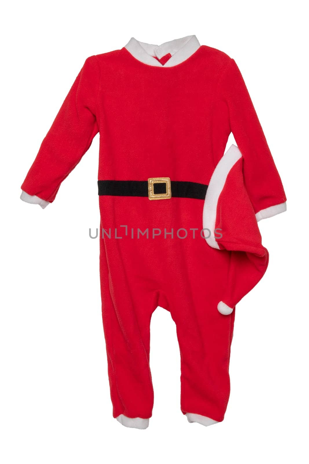 Christmas clothes. Close-up of red kids Christmas Santa Claus jumpsuit with holding hat isolated on a white background.