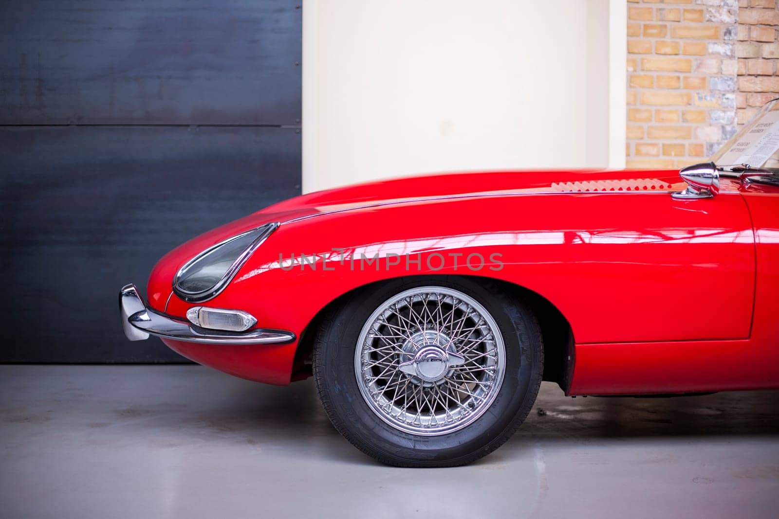 Classic vintage car. Close-up of headlights of luxurious vintage vehicle