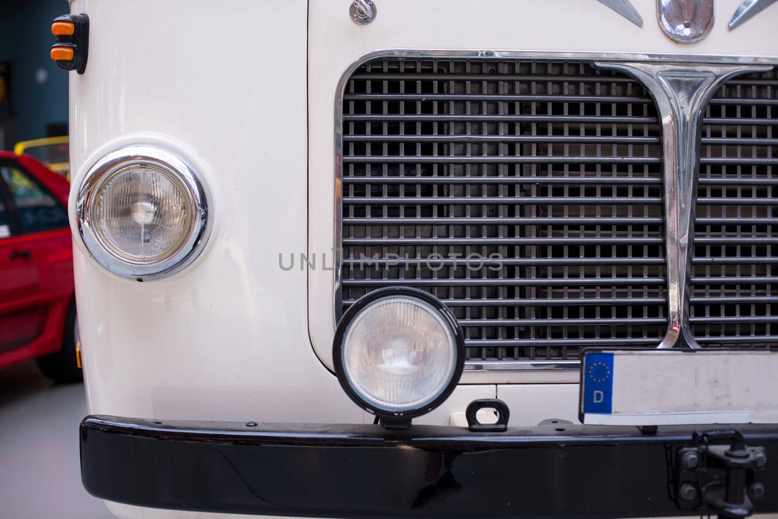 Classic vintage car. Close-up of headlights of luxurious vintage vehicle