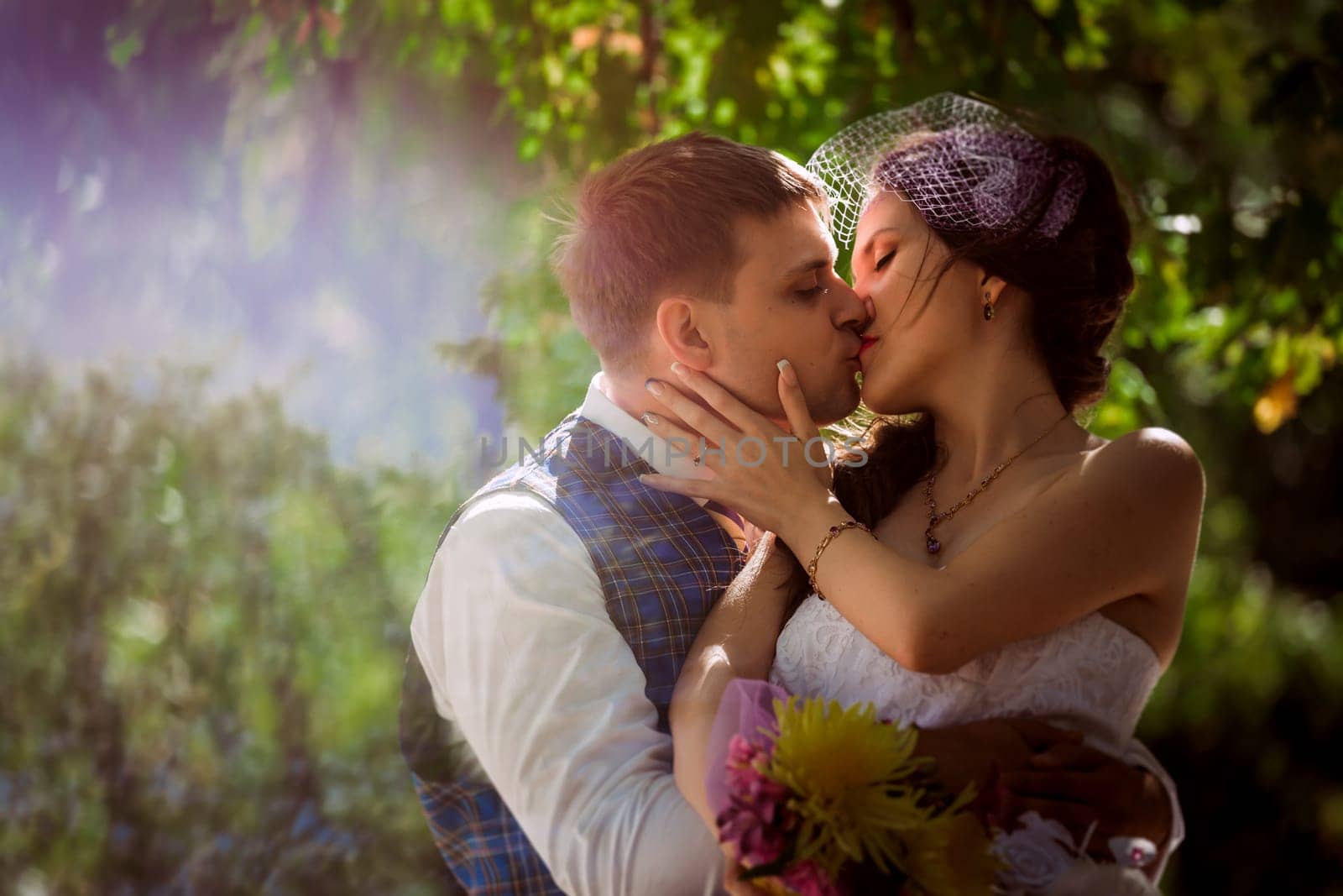 Married Couple in forest embracing