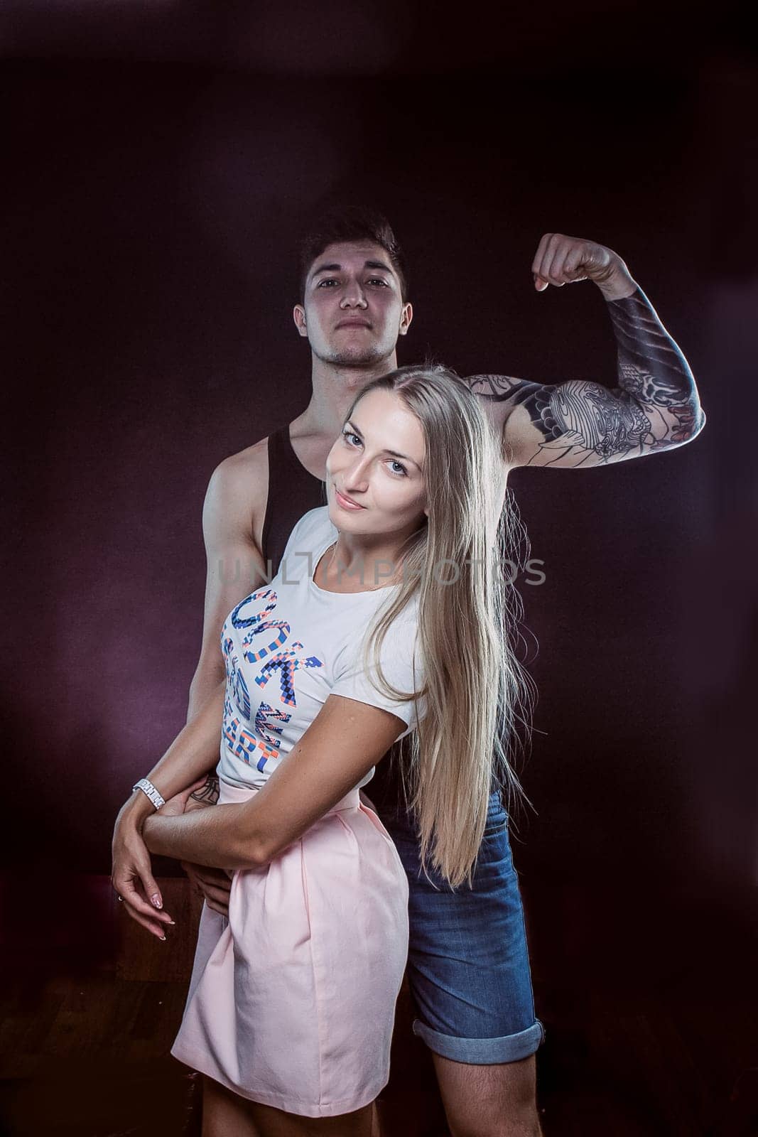 Sexy passion couple, beautiful young man and woman closeup, studio shot