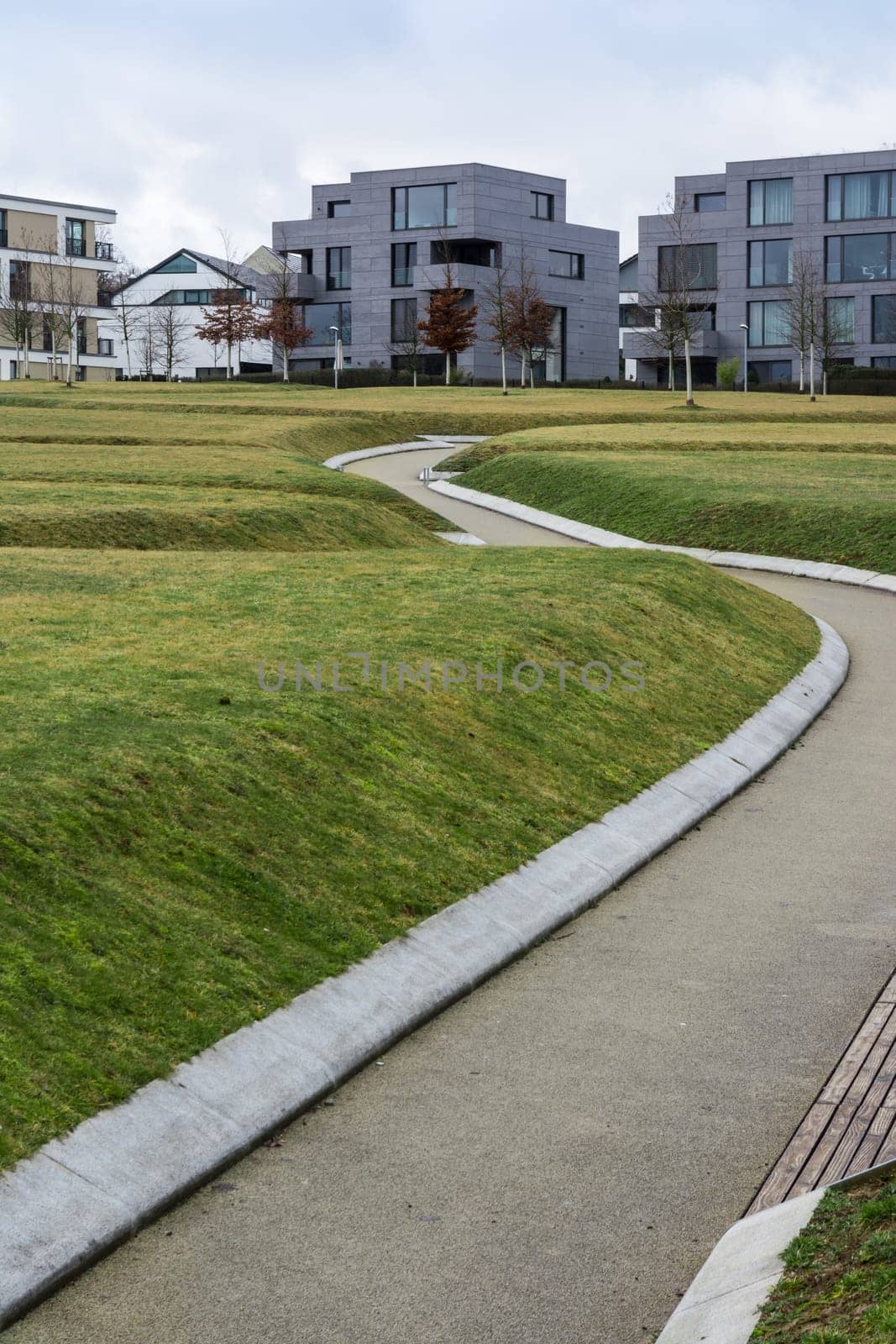 Unique Architectural Home Design Square Rectangular Geometric Angles Hard Right WIndows Alone Apartments Outdoors Park Public Store Path Leading
