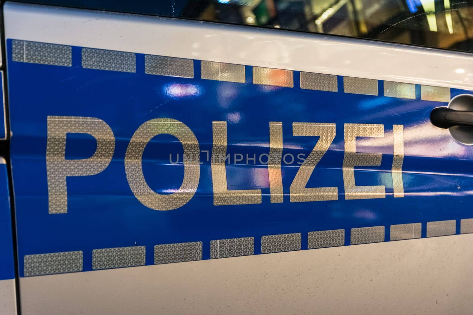Afternoon Night City Lights Reflecting Against Police Car Letters German Sign European