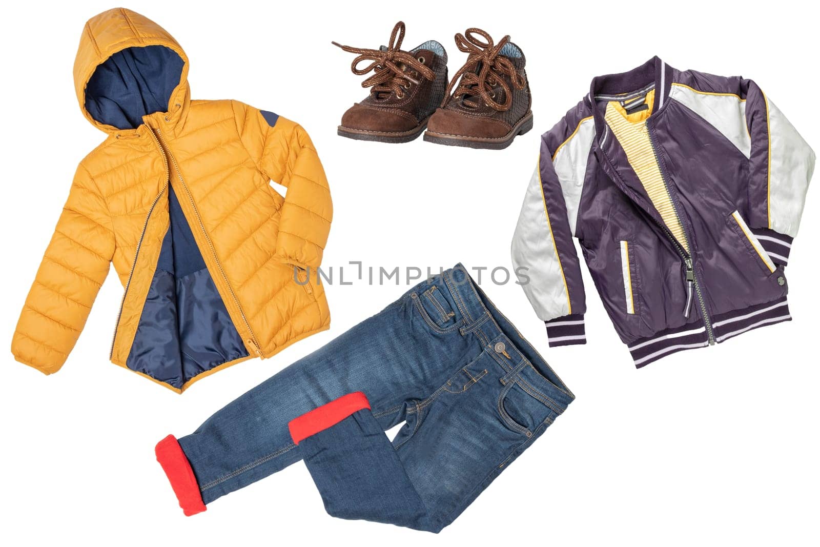 Childrens winter clothes. A collage set of childrens warm jackets, a warm thermojeans and a matching winter shoes isolated on white background. Children autumn and winter fashion.
