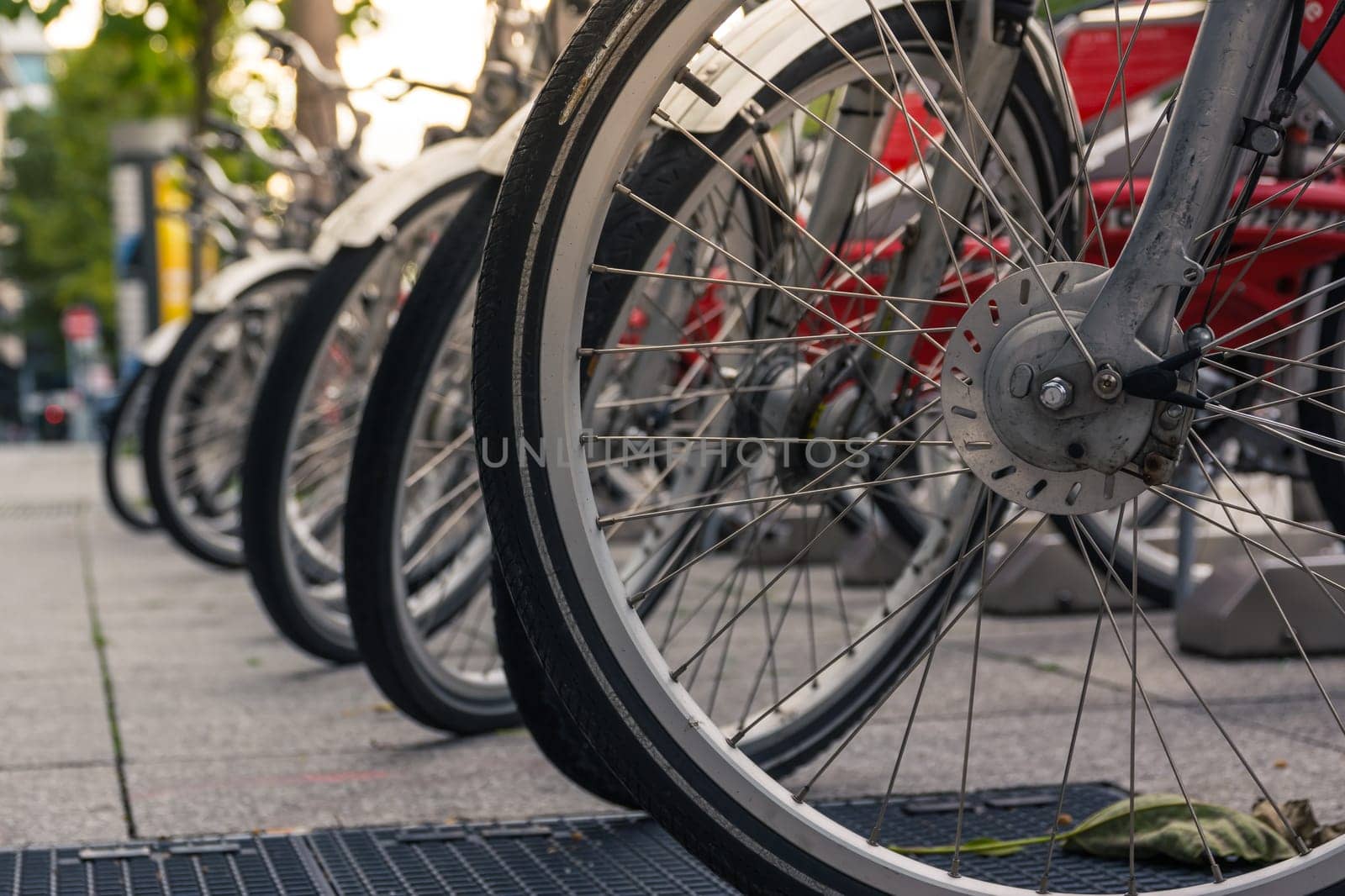 Bike Wheels in Rack Closeup Detail Shot City Urban Environment Public Sharing Bicycle