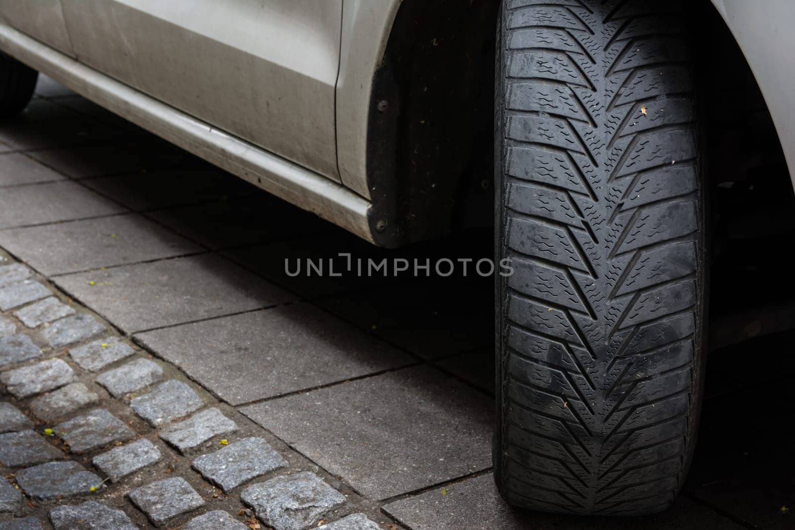 Car Tire Turned Sidewalk Parked Black White Asphalt Road Dirty Used