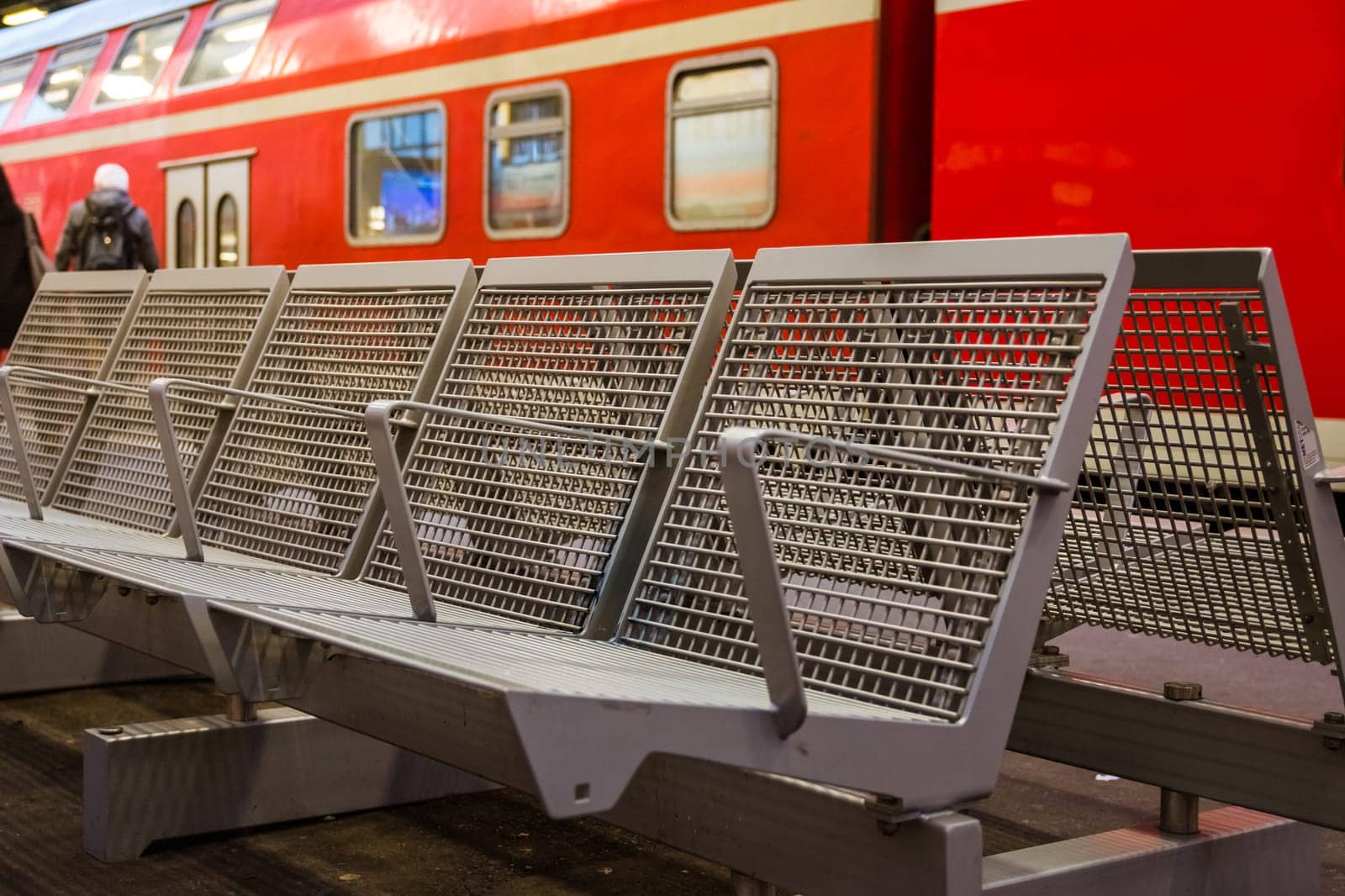 Train Station Metal Wire Bench Public Sitting Waiting German European Outdoors Red Color Closeup