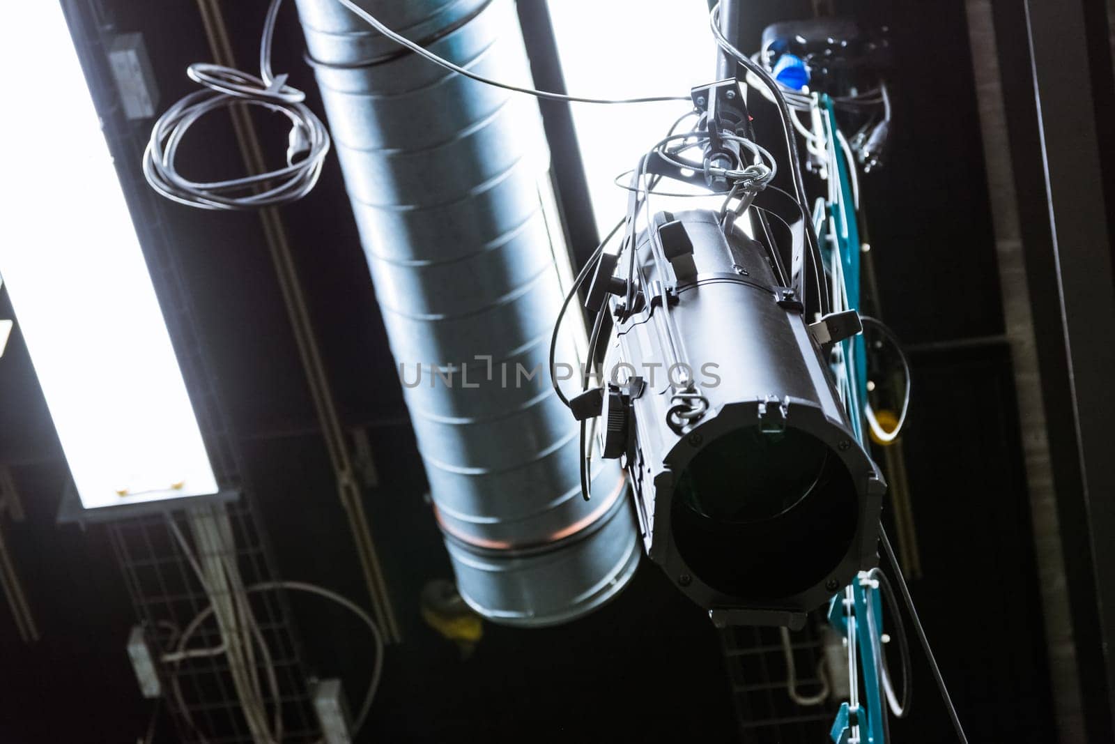 TV Studio Single Light Hanging Above Flourescent Idle Turned Off Equipment Technical