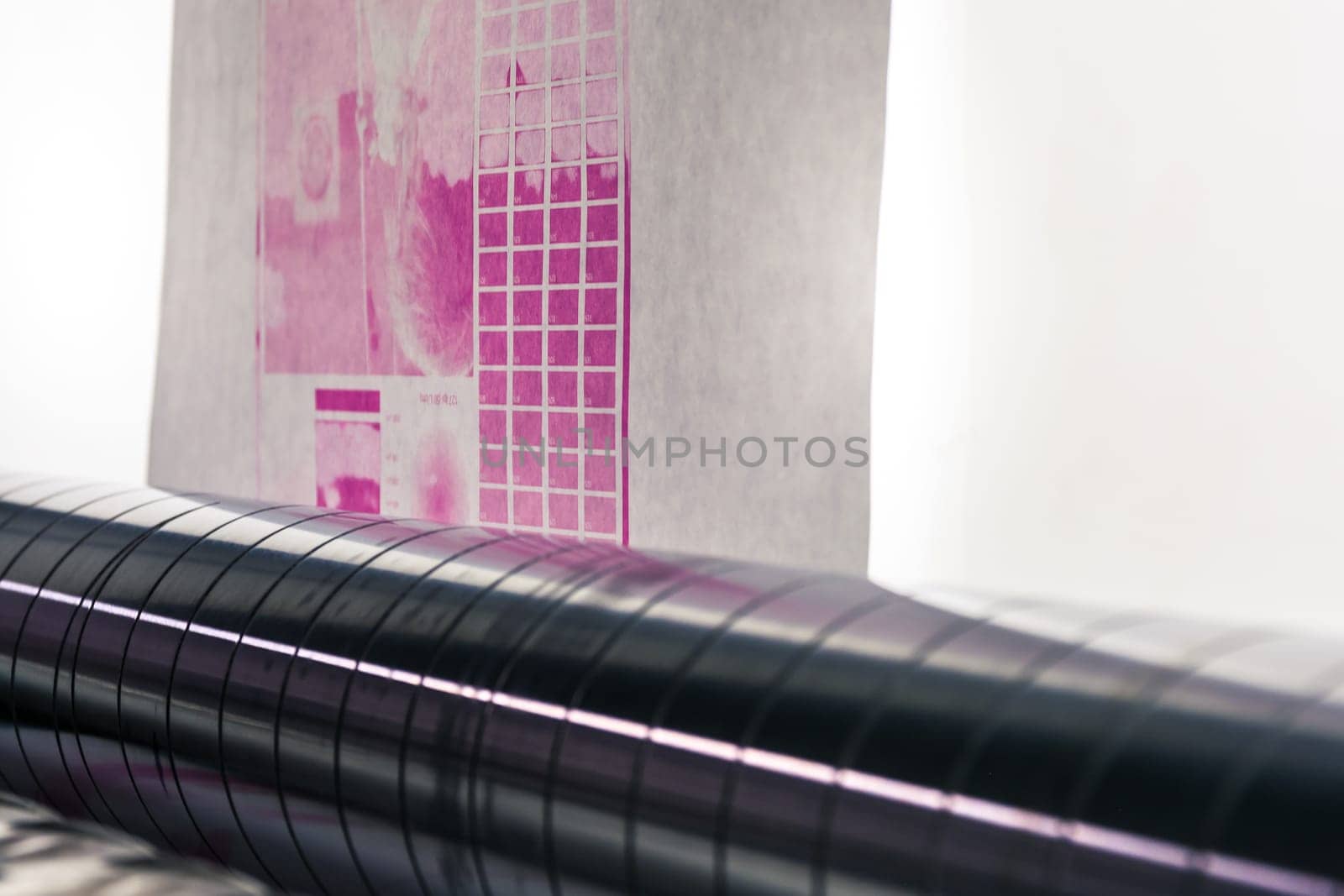 Flexography Backlit Proofing Web Roller Preview Test Calibration Closeup Press Machine Industrial Running Magenta Quality Sheet Material