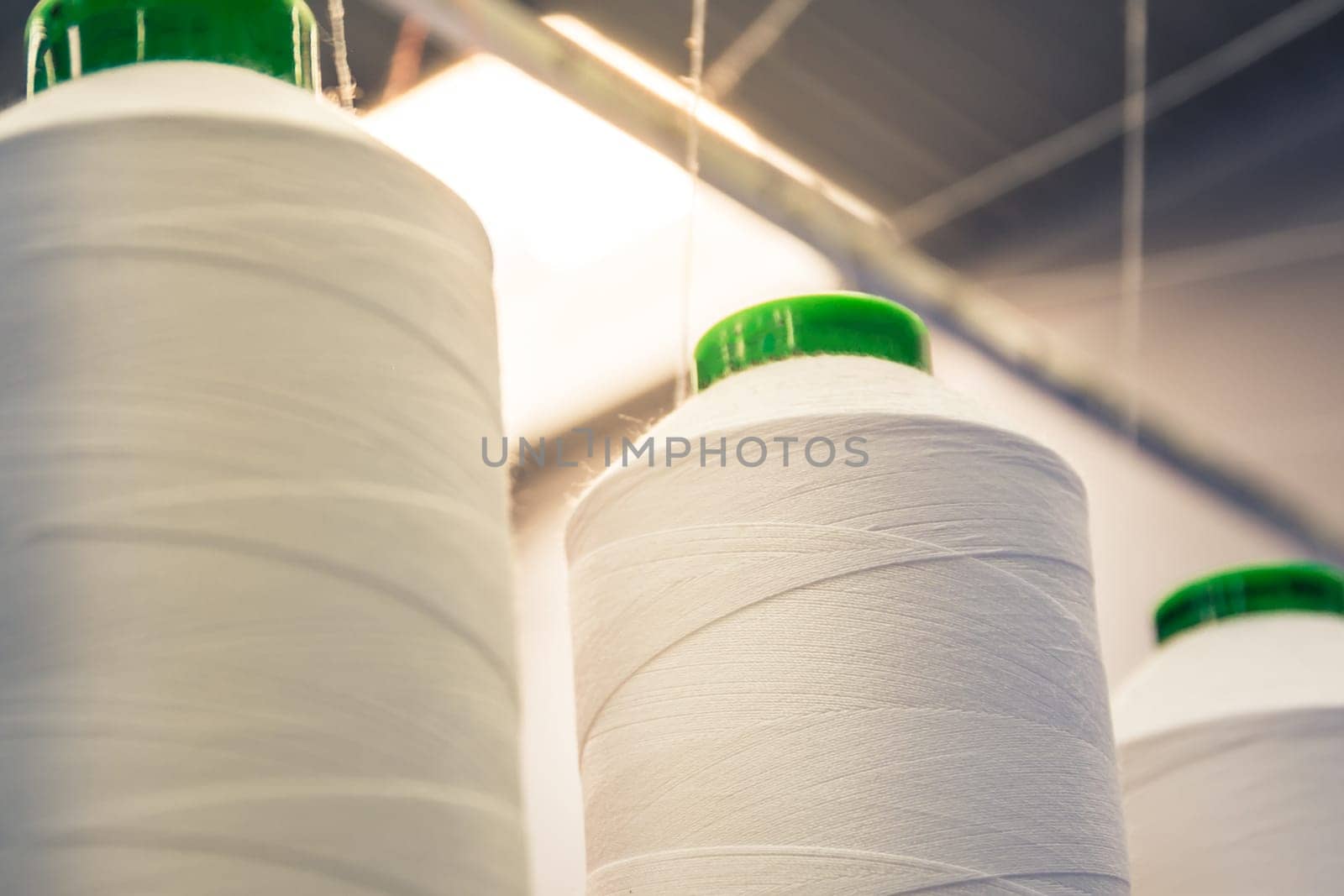 Industrial Fiber Spools Cotton Thread Factory Flare Closeup