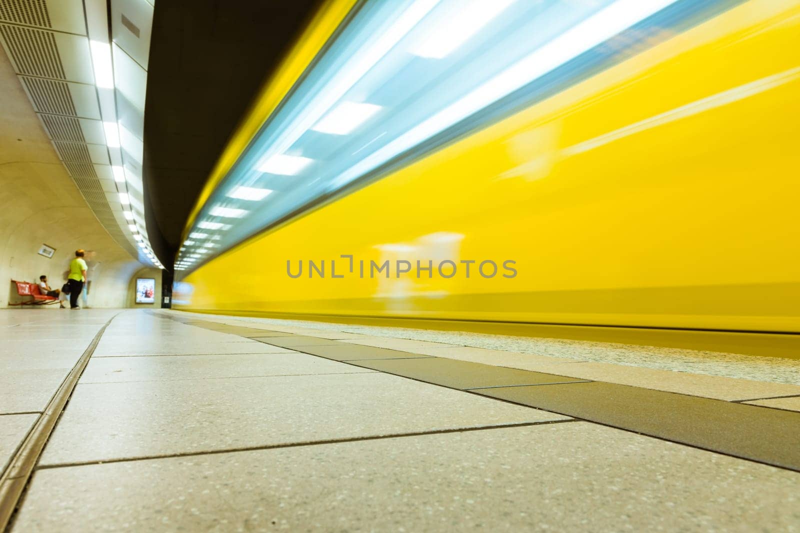 German Subway Yellow Wagon Long Exposure Passing Bend Light Streaks Urban Transportation