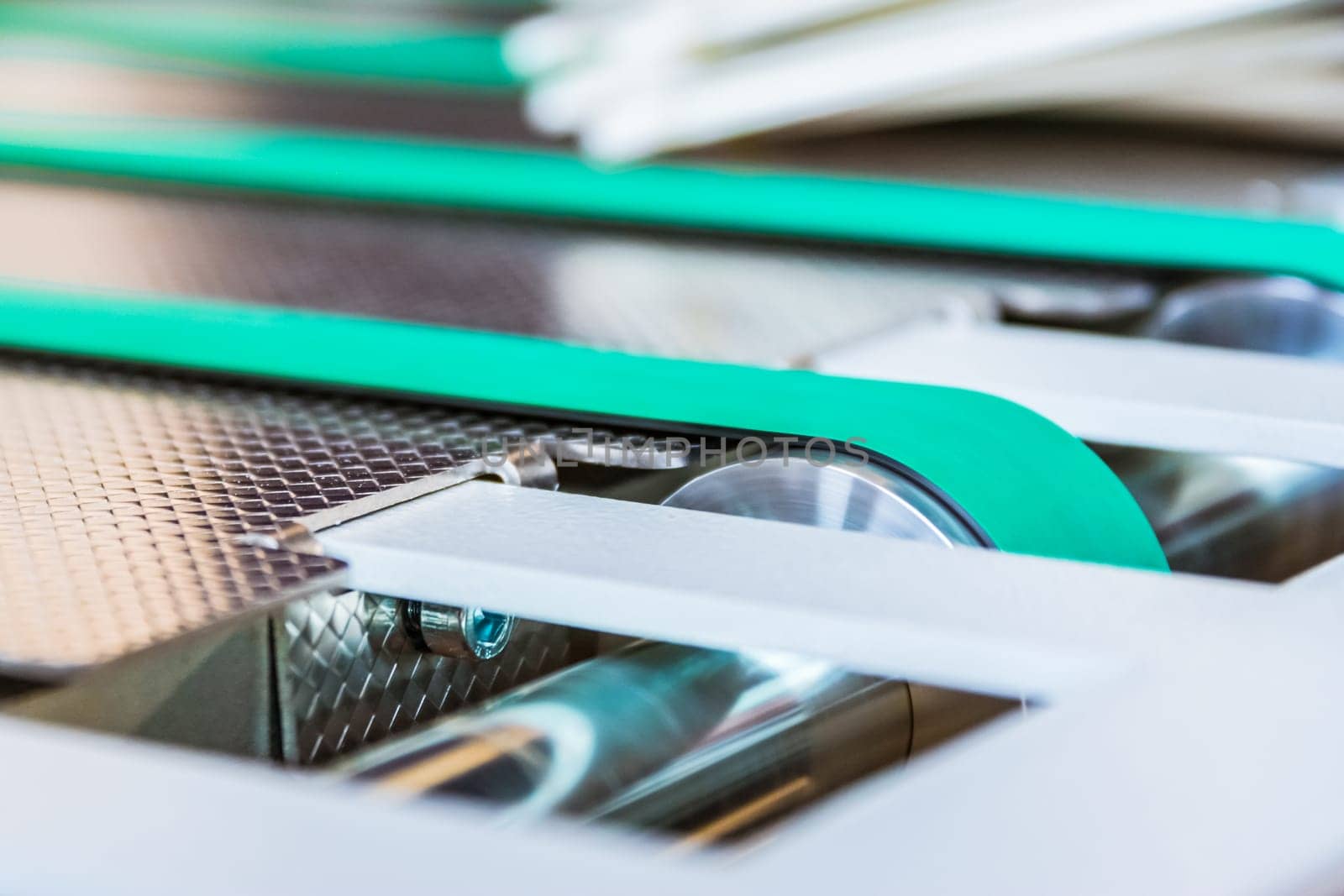 Paper Folding Machine Conveyor Belt Rubber Thin Lines Green Wheels Steel Moving Machinery Industrial Production