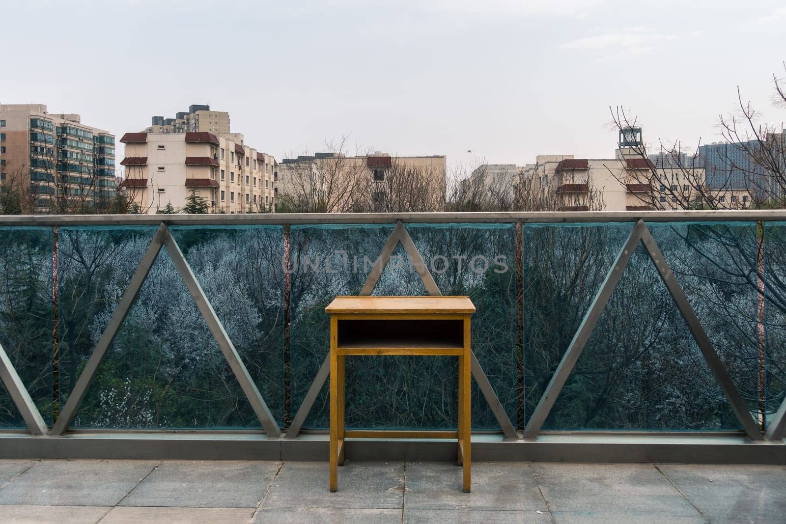 A Desk Standing on an Overpass in China