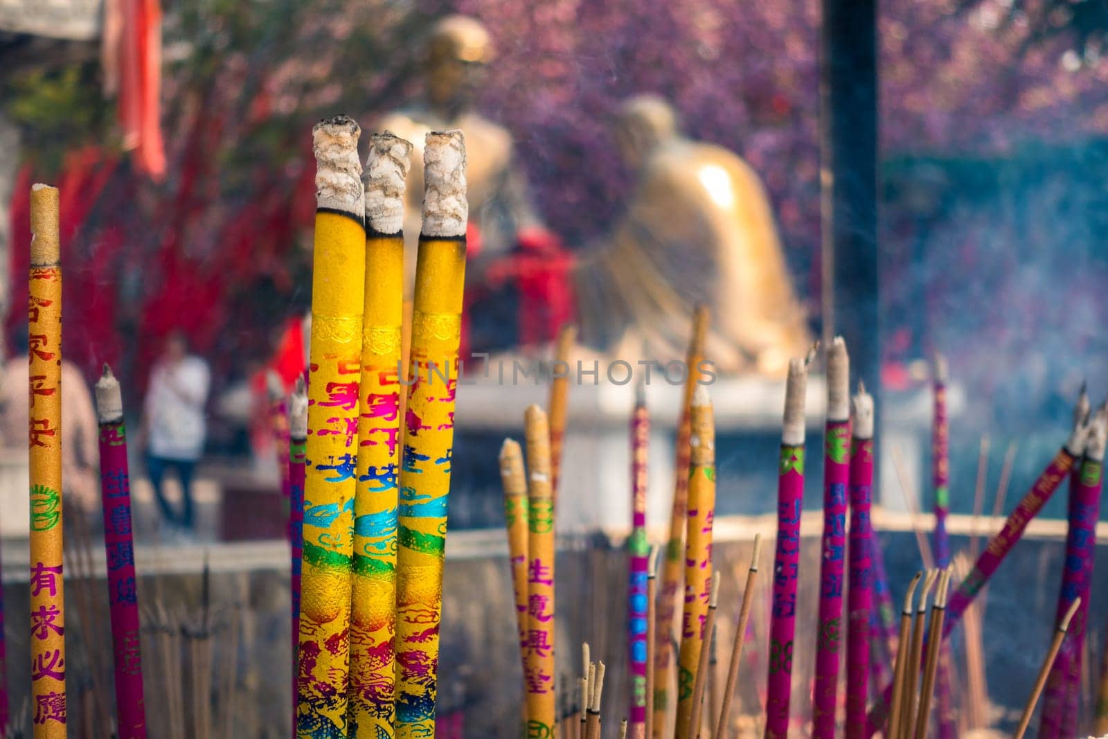 Chinese People Burn Incense and Pray in an Ancient Chinese Temple